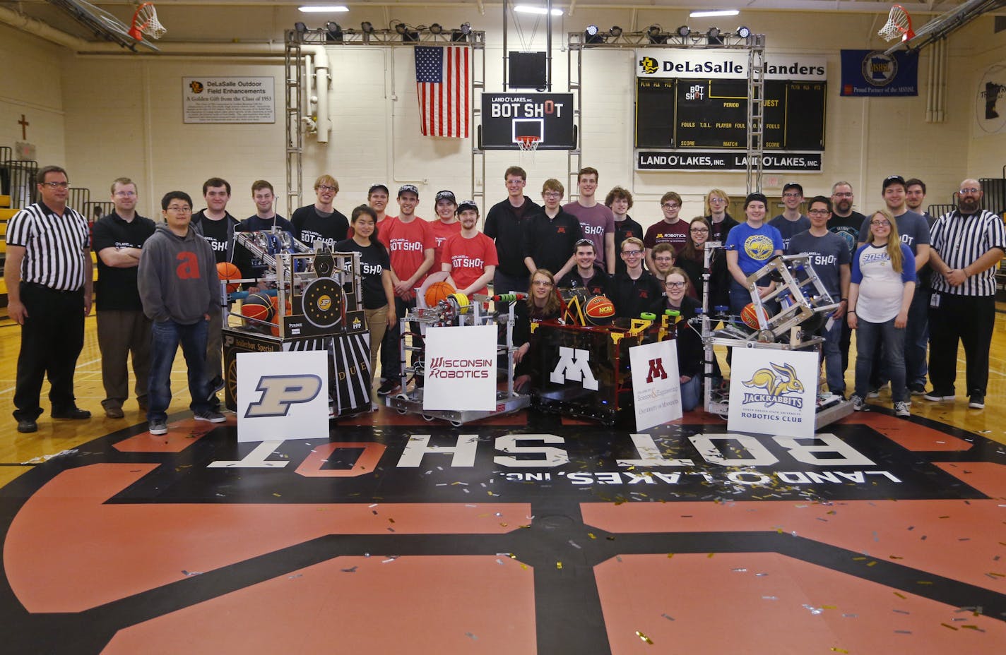 Robotics team members from the University of Minnesota, Purdue, Wisconsin and South Dakota State held a robot-shooting competition, sponsored by Land O' Lakes at a student-and-family packed DeLaSalle High School gym downtown last Sunday; same weelemd as Final Four activities elsewhere downtown.
Photo: Bruce Kluckhohn/AP Images for Land O'Lakes Inc.)