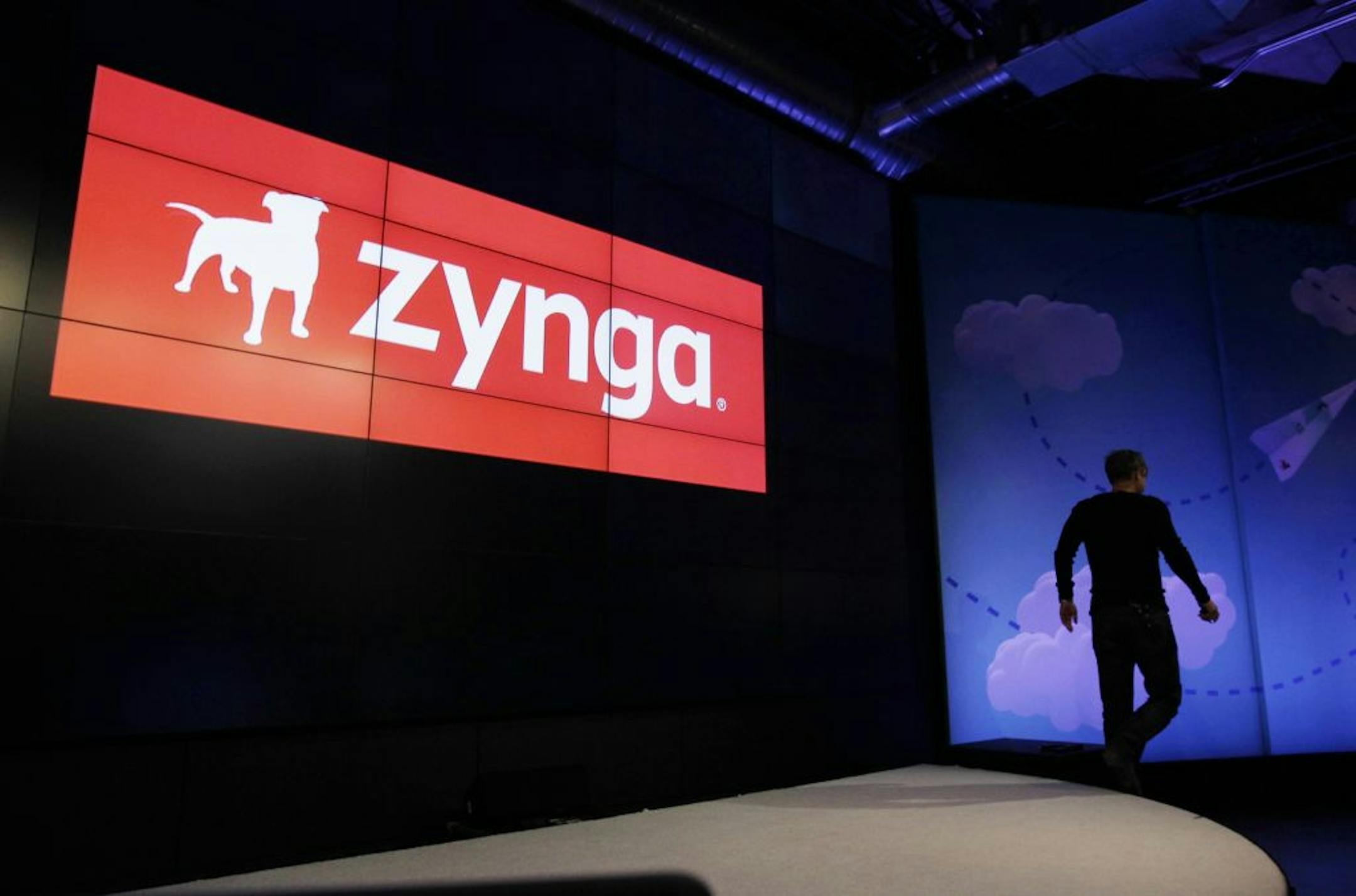 In this June 26, 2012 photo shows Zynga CEO Mark Pincus walks off the stage after an announcement of new games at Zynga headquarters in San Francisco. Not long ago, online games company Zynga looked on pace to unseat much bigger, well-established rivals as it rode the popularity of "FarmVille," the clicking game of virtual cows and real money. But the iPad came along, and more people bought smartphones. People weren't playing Zynga's games on Facebook and computers as much as they used to. Zynga
