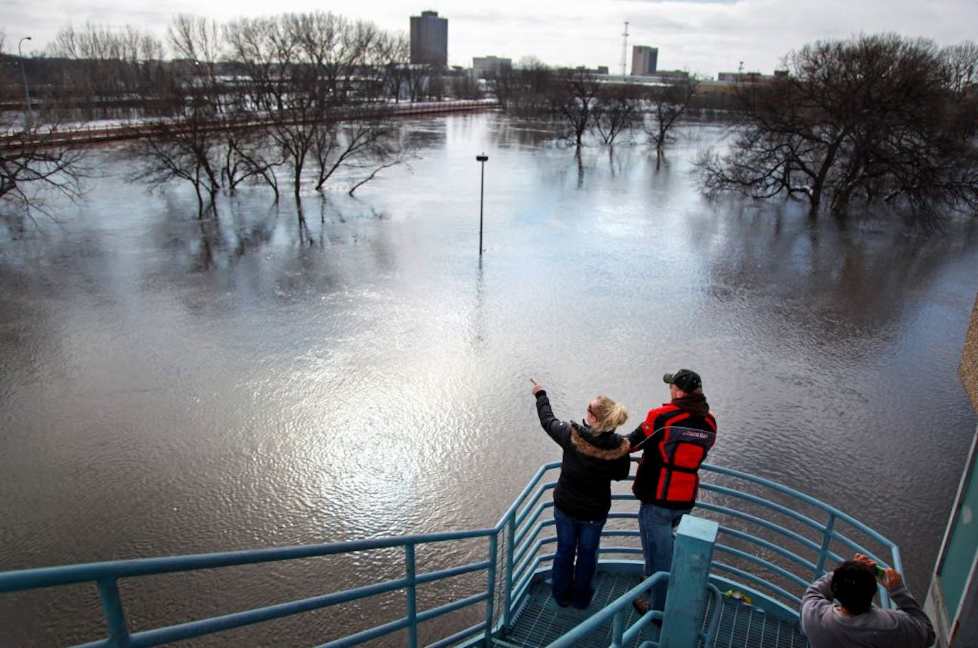 Weather forecasters don't expect a repeat of this March 2009 panorama of the Red River, with downtown Fargo in the distance. Months of drought and little snowpack have eased flood fears.