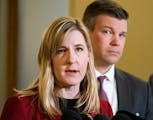 House Speaker Melissa Hortman and Majority Leader Ryan Winkler came out of the Governor's office to respond to the Republicans new budget offer. ] GLE