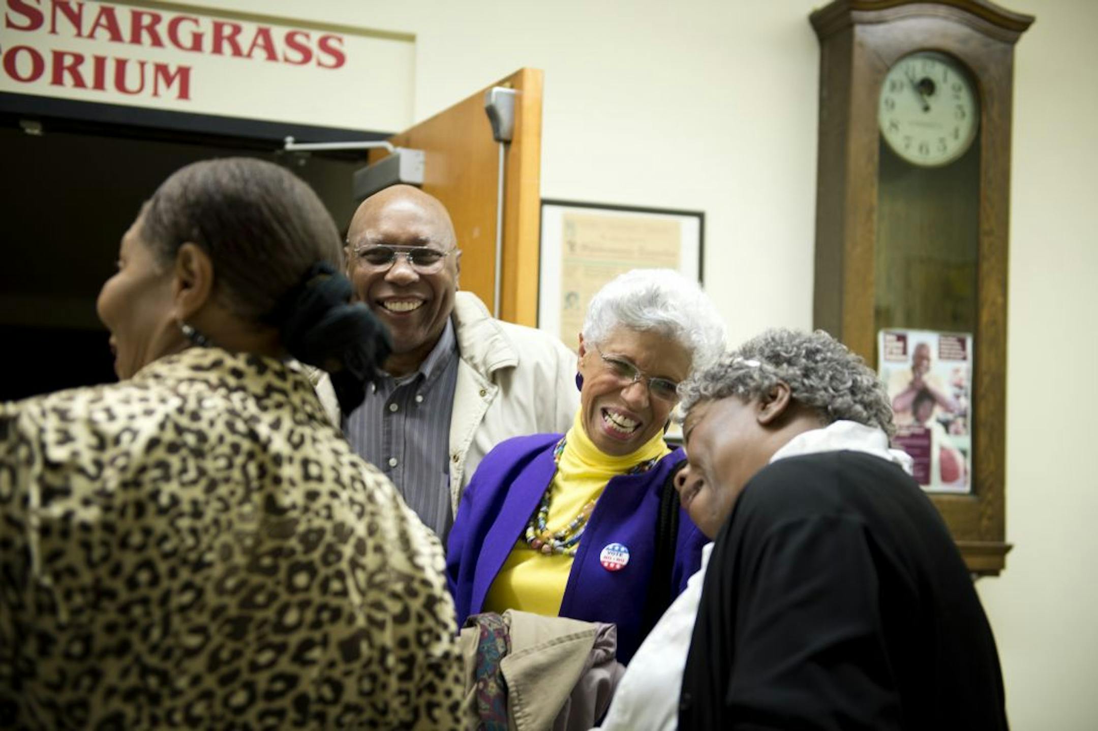 Josie Johnson, with friends at Sabathani Community Center, said during her speech that the lessons of history cannot be ignored.
