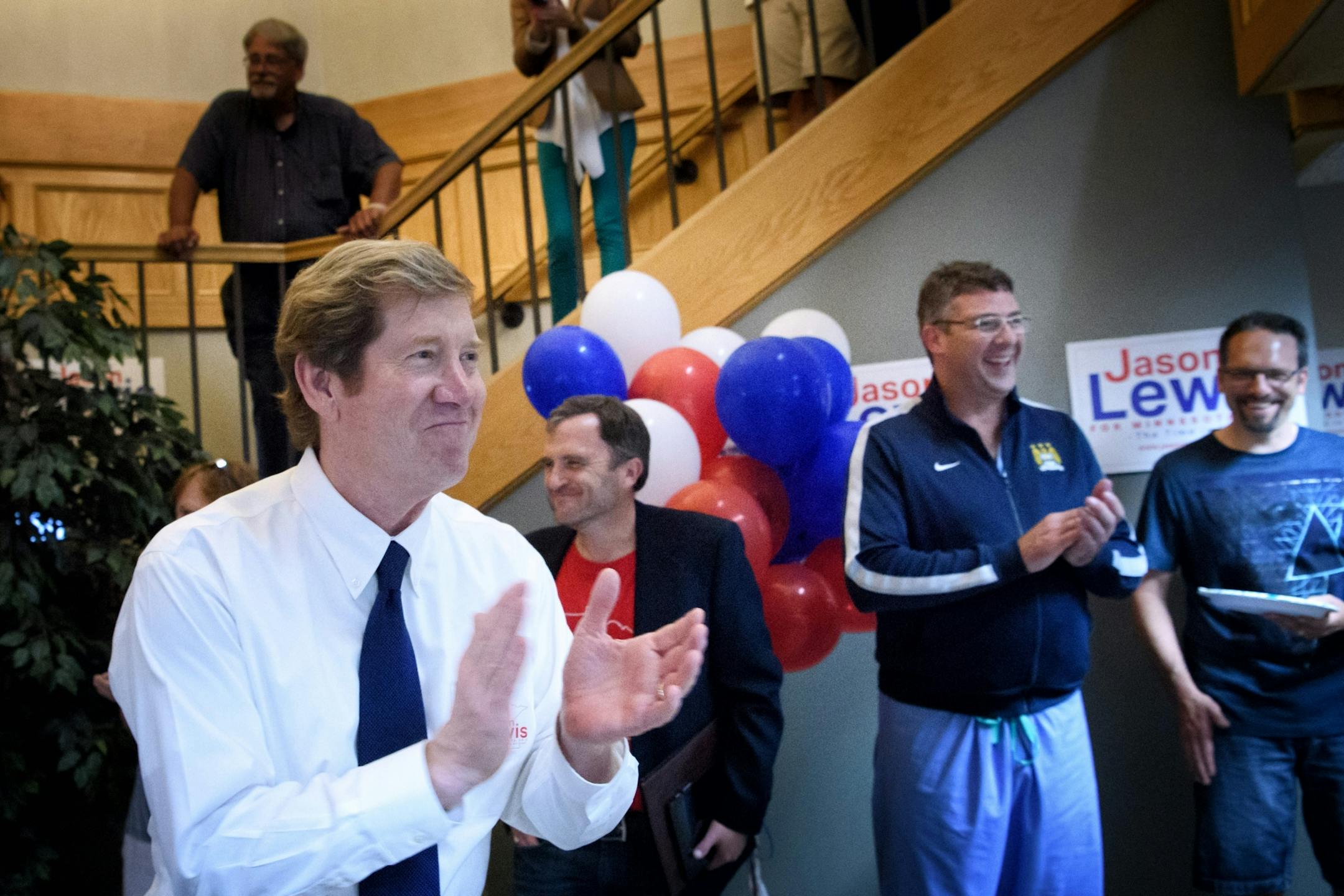 Republican primary candidate Jason Lewis came downstairs to talk to supporters in his Burnsville campaign headquarters just after the polls closed. He is running against three other Republicans for John Kline's Congressional seat in the second congressional district. The winner of this primary will run against Democrat Angie Craig.