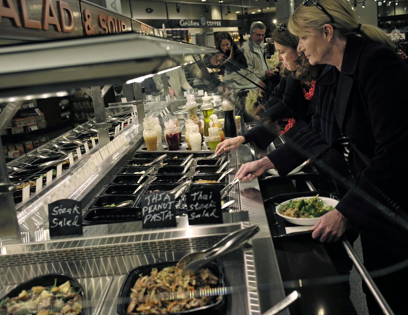 At the Lunds and Byerly's Kitchen in downtown Wayzata, the extensive salad bar is a popular destination.]richard.tsong-taatarii/rtsong-taatarii@startribune.com ORG XMIT: MIN1404021339380101