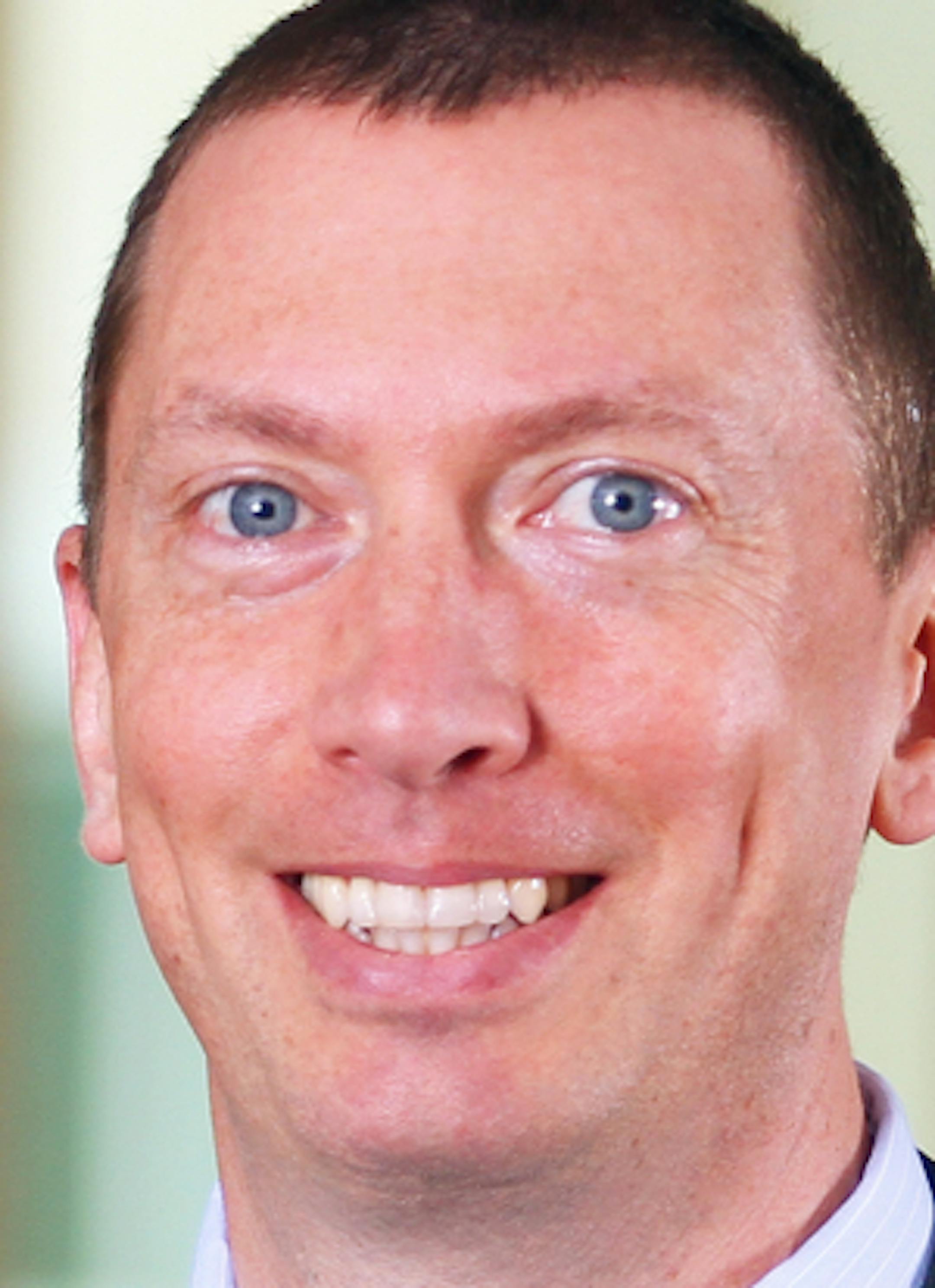 Environmental portrait of Jay Ebben taken on Friday, April 12, 2013 on the Minneapolis campus of the University of St. Thomas.