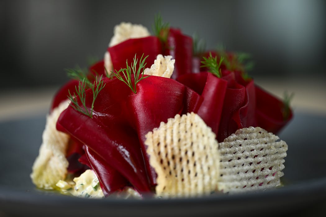 Dario's beet salad, with marinated beets, sauce gribiche and dill pickle chips, is made for Instagram.