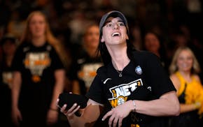 Iowa guard Caitlin Clark reacts to fans during an Iowa women's basketball team celebration, Wednesday, April 10, 2024, in Iowa City, Iowa. Iowa lost t