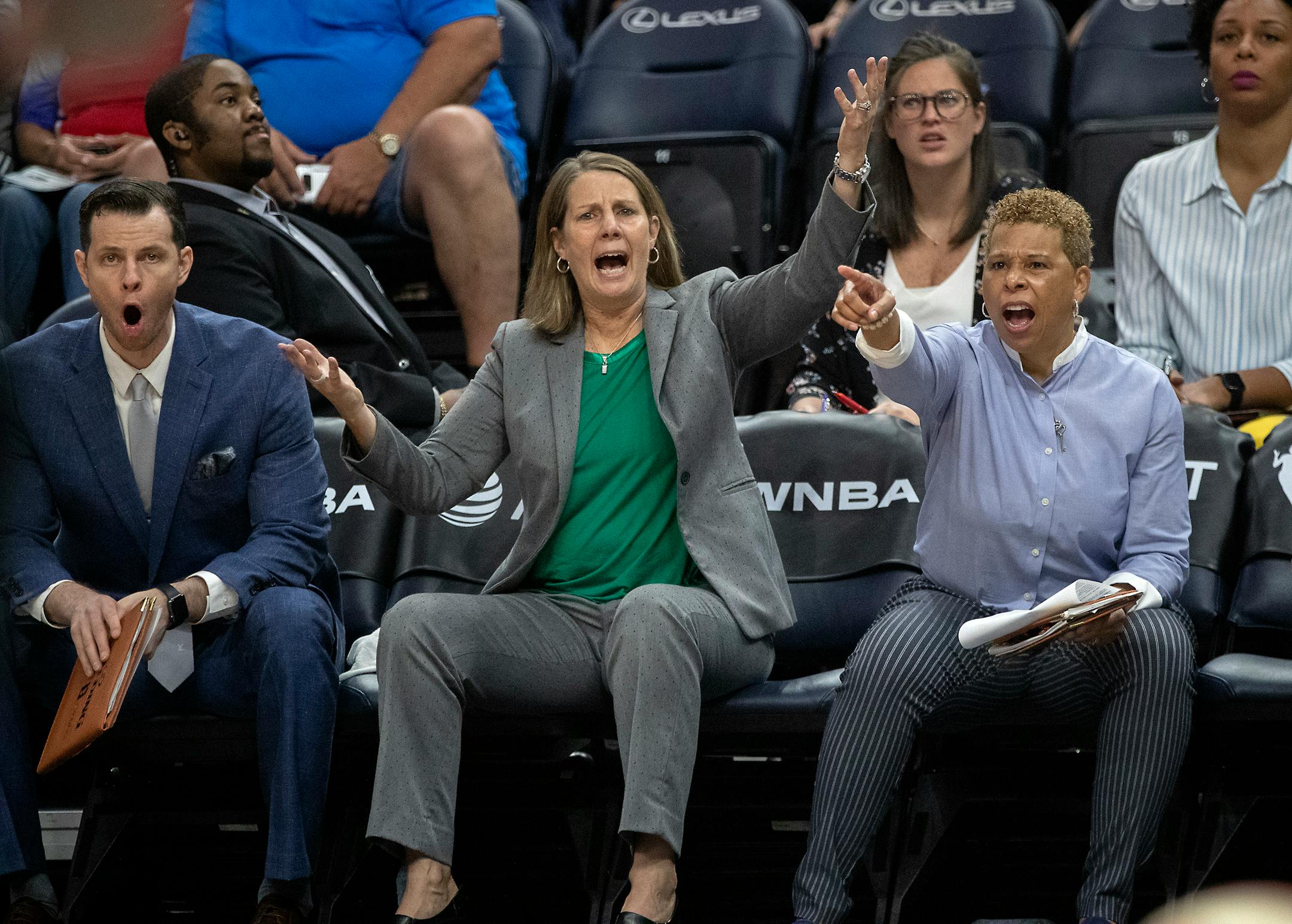 Lynx assistant coach Walt Hopkins (left, next to head coach Cheryl Reeve) will be hired as the next head coach of the New York Liberty, a person familiar with the situation told the Associated Press.