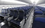 FILE - In this Jan. 26, 2016, file photo, economy class seating is shown on a new United Airlines Boeing 787-9 undergoing final configuration and main