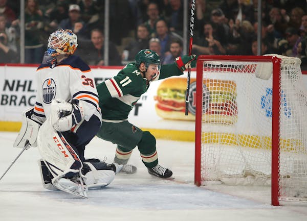 Wild left wing Zach Parise celebrated a first-period goal on Edmonton Oilers goaltender Cam Talbot.