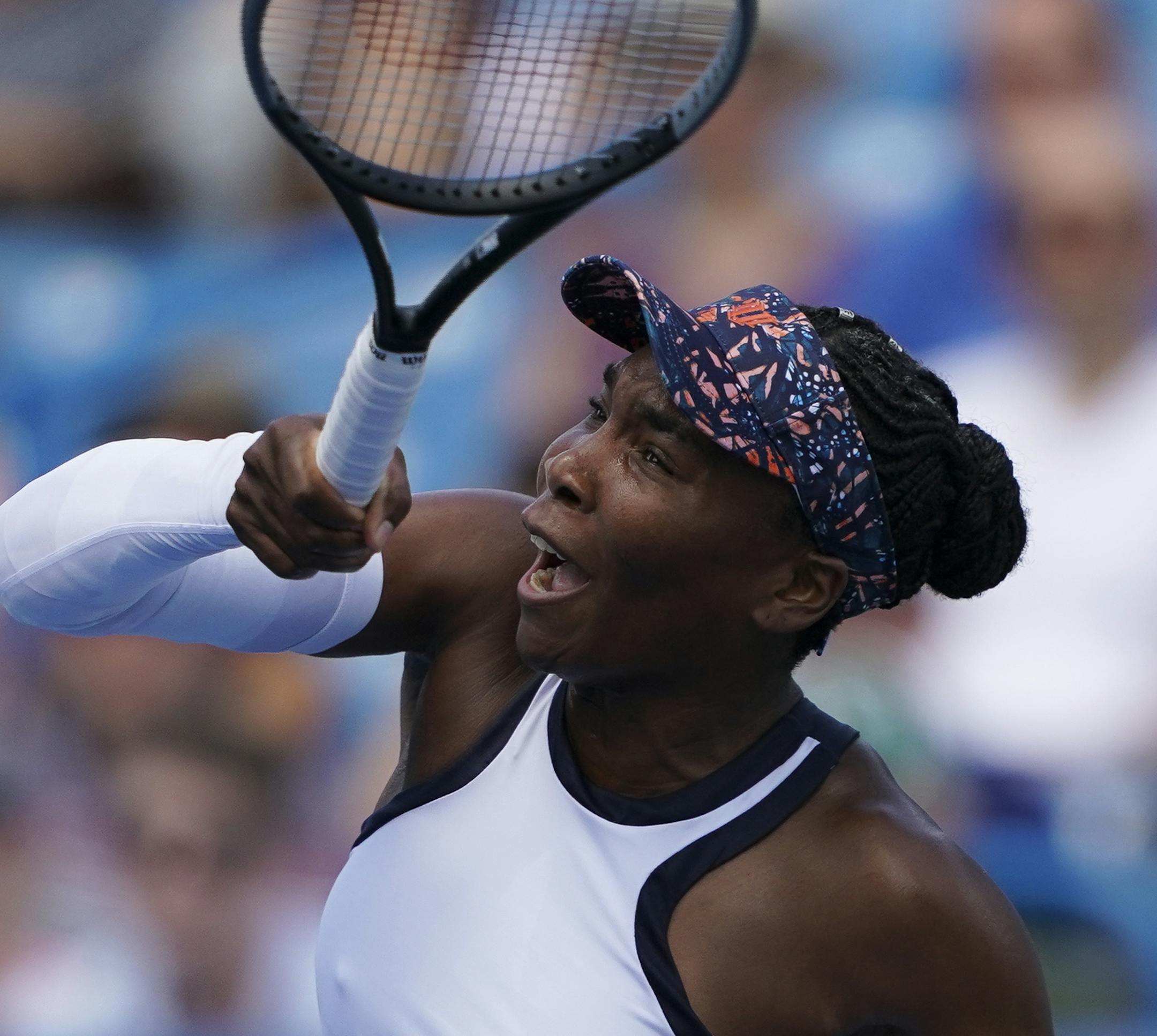Venus Williams returns to Donna Vekic, of Croatia, during the quarterfinals of the Western & Southern Open tennis tournament, Thursday, Aug. 15, 2019, in Mason, Ohio. (AP Photo/John Minchillo)