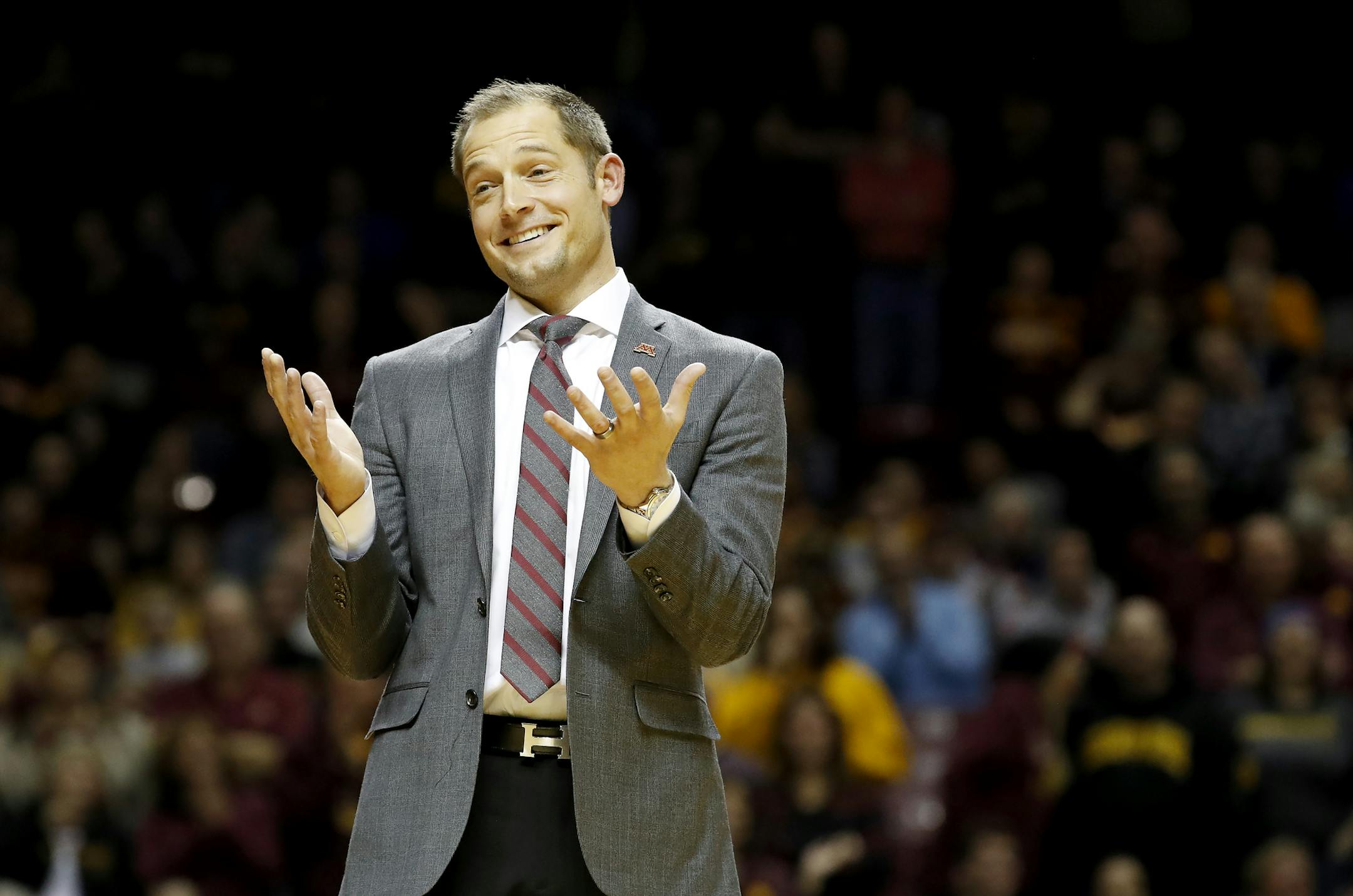 Minnesota Gophers head football coach P.J. Fleck addresses the crowd and helped the half time entertainment act Red Panda at William Arena. ] CARLOS GONZALEZ cgonzalez@startribune.com - January 8, 2017, Minneapolis, MN, Williams Arena, NCAA Basketball, University of Minnesota Gophers vs. Ohio State Buckeyes ORG XMIT: MIN1701081947460467