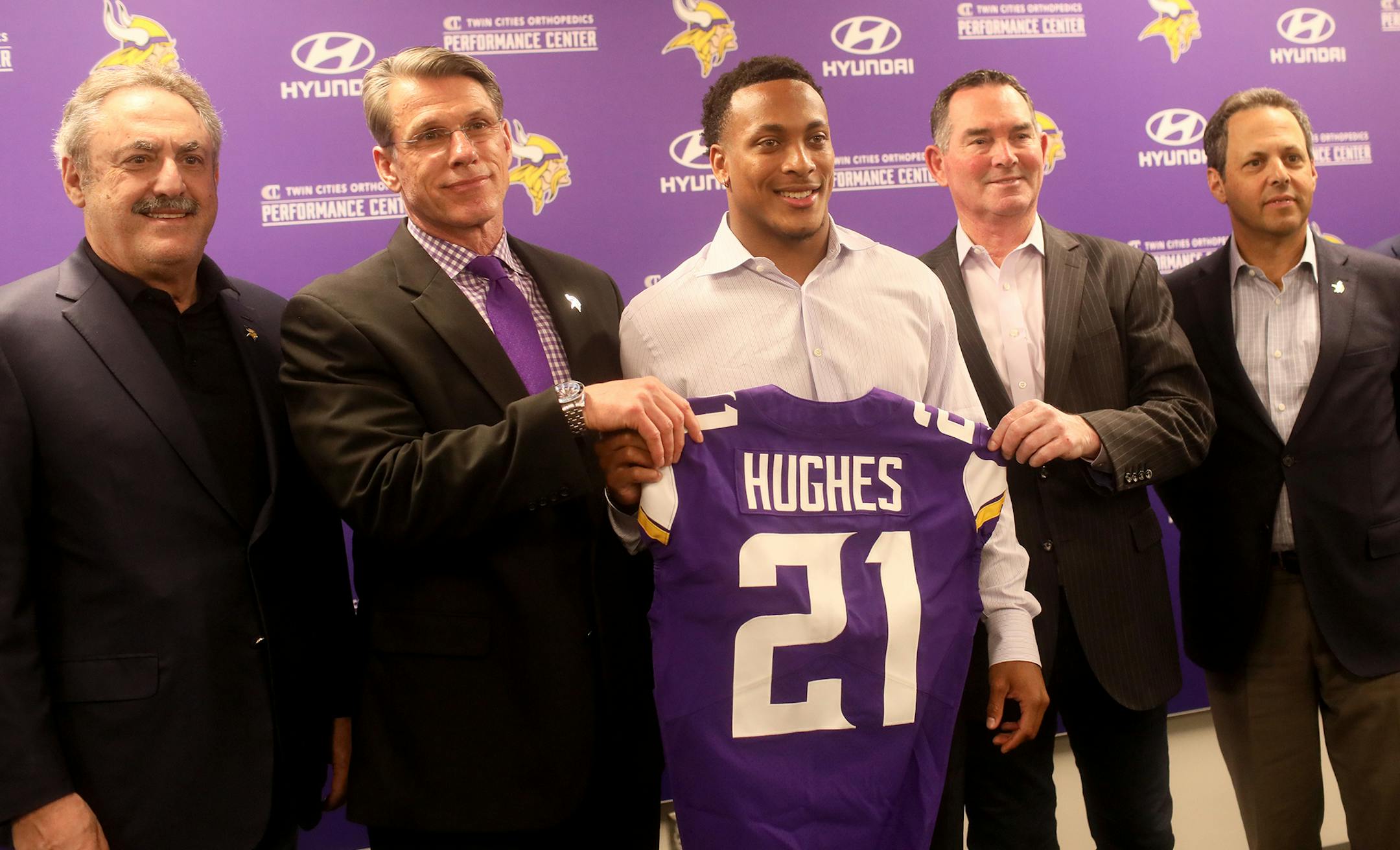 Minnesota Vikings first round pick cornerback Mike Hughes from the University of Central Florida, surrounded by Zygi Wilf, Vikings owner, left to right, Vikings general manager Rick Spielman, Vikings head coach Mike Zimmer, and Mark Wilf, Vikings owner and President, while introduced to local media members Friday, April 27, 2018, at the Twin Cities Orthopedics Media Center.] DAVID JOLES ï david.joles@startribune.com Vikings CB Mike Hughes will be introduced at 5:00 p.m. CT on Friday, April