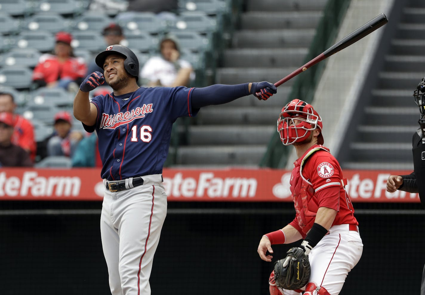 Minnesota Twins' Jonathan Schoop follows the path of his three-run home run against the Los Angeles Angels during the second inning of a baseball game Thursday, May 23, 2019, in Anaheim, Calif. (AP Photo/Marcio Jose Sanchez)