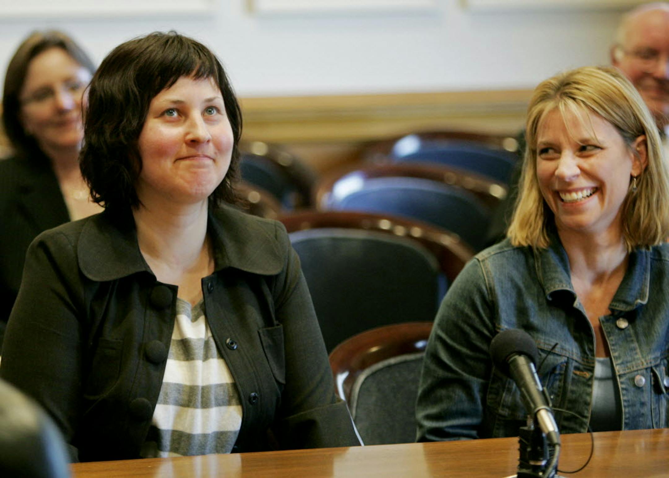 Interstate 35W Bridge collapse victim Mercedes Gorden Rudh, left, and Jennifer Holmes, right, whose husband was killed in the collapse, expressed gratitude Tuesday at a legislative committee in St. Paul, on how smoothly the compensation process went for victims of the Aug. 1, 2007 bridge collapse in Minneapolis.