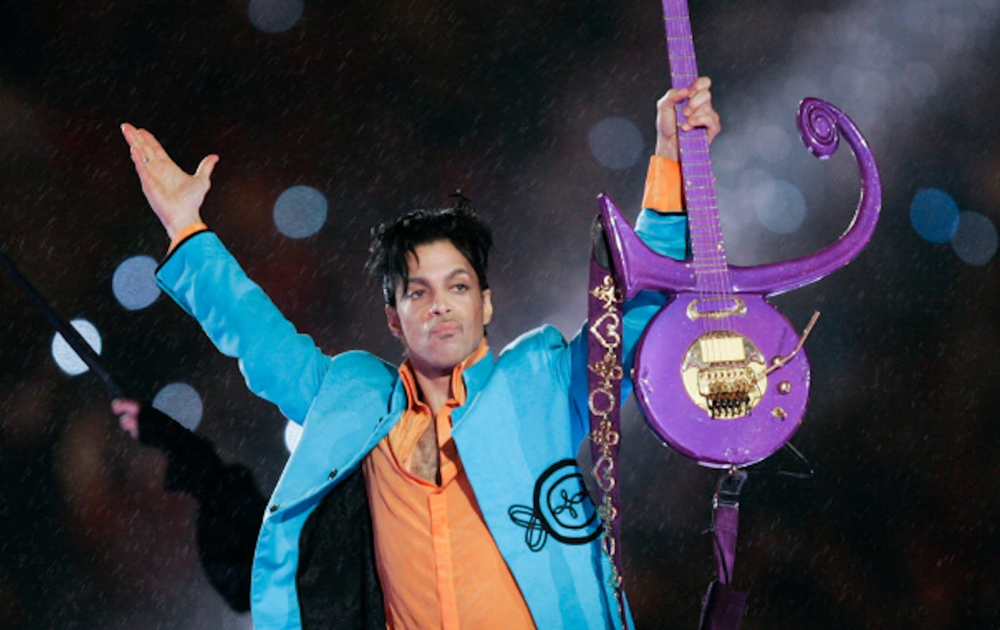 In this Feb. 4, 2007 file photo, Prince performs during halftime of the Super Bowl XLI football game in Miami. Minnesota court records show a wrongful death lawsuit filed by Prince's family members has been quietly dismissed in recent months against all defendants. Prince died of an accidental fentanyl overdose on April 21, 2016.