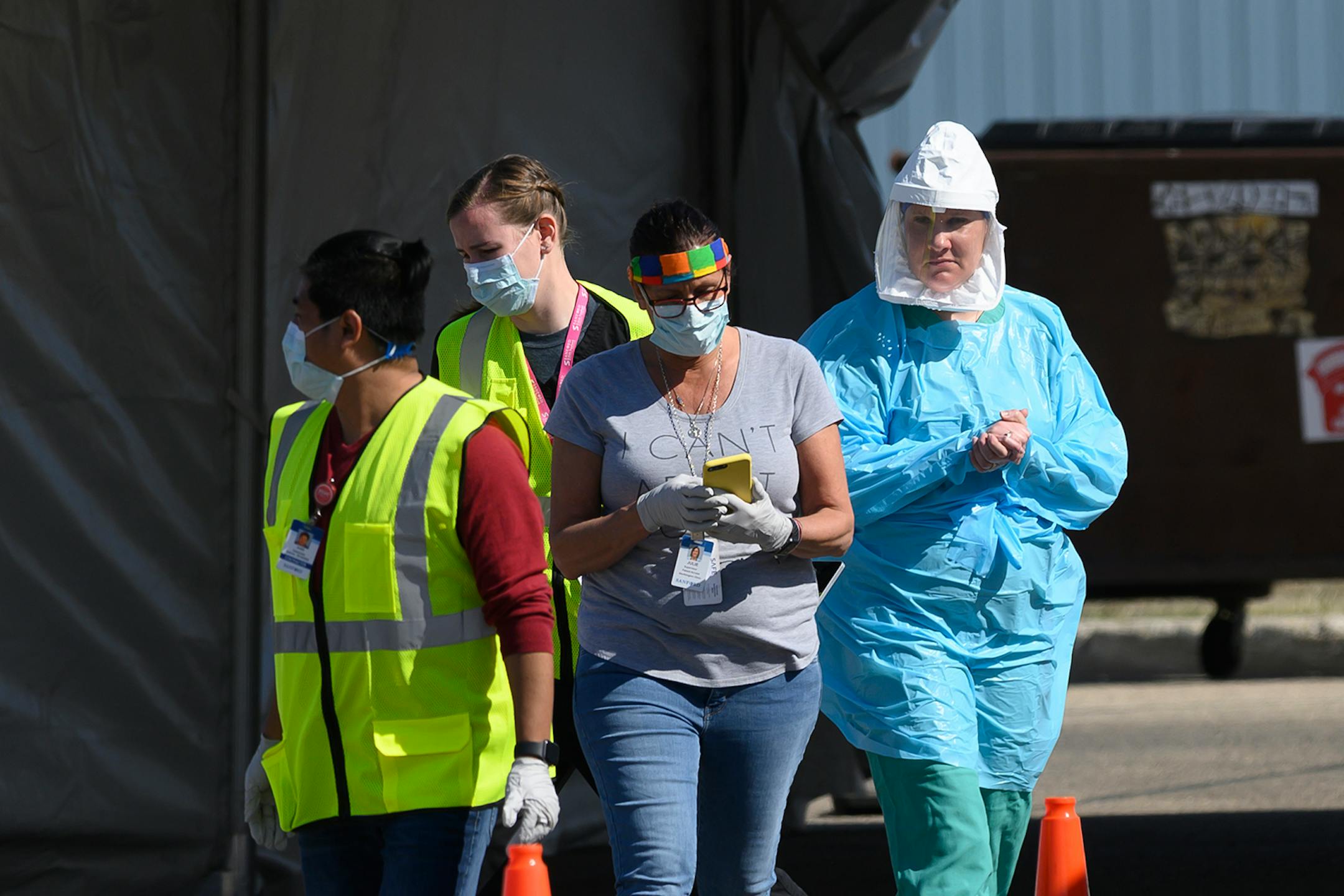 Medical workers administered drive-up COVID-19 tests Saturday outside the Sanford Worthington Clinic. At least 19 cases were confirmed at the JBS pork plant here, an hour east of the Smithfield Foods pork plant in Sioux Falls, which was shut down last week when nearly 300 workers were infected with the disease. Now with a foothold in Worthington, a city of 10,000 people, communities across southwestern Minnesota are on edge. "It was just a matter of time," said Oberloh, a City Council member and
