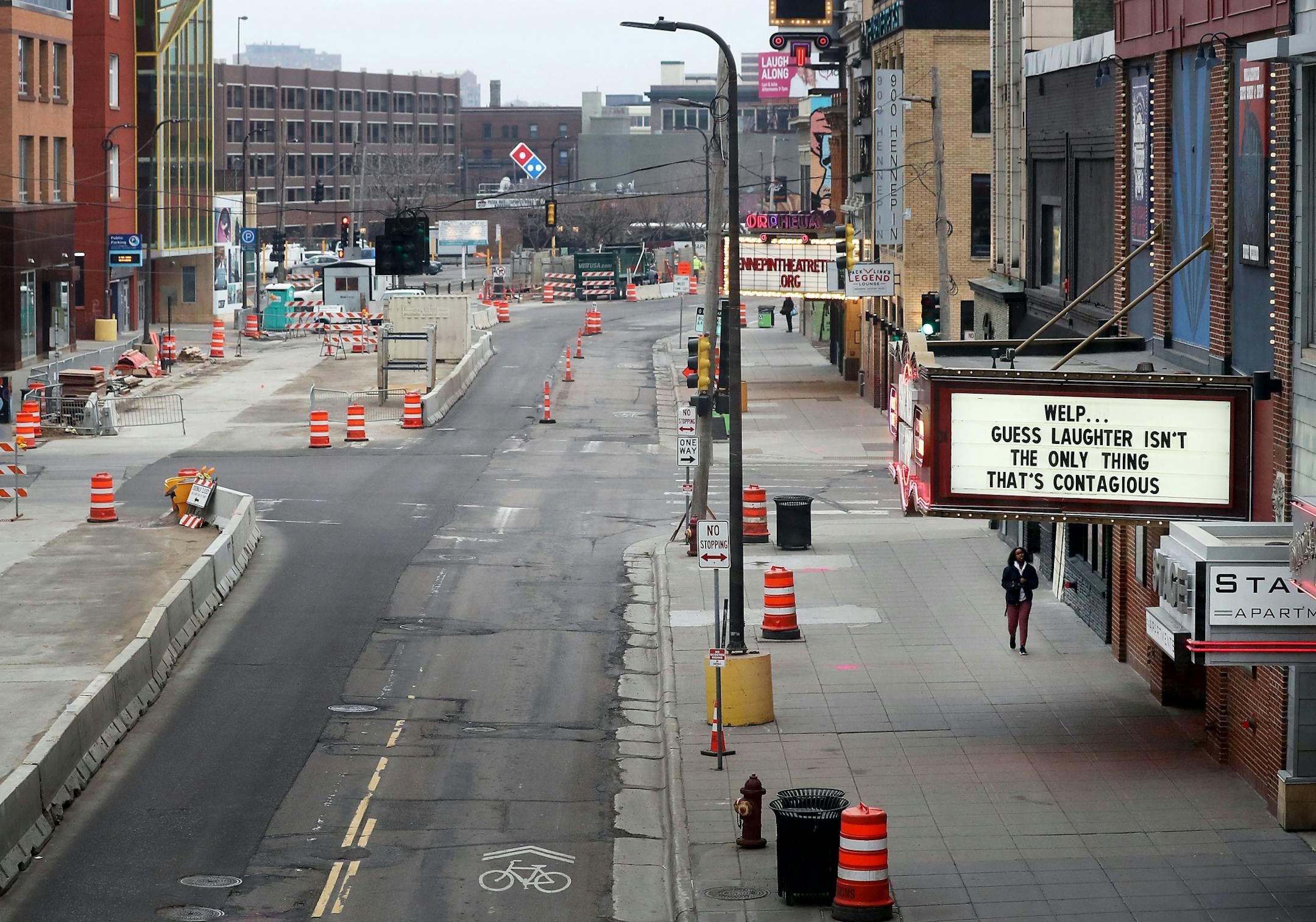 Traffic in the theater district was light as the marquee message above Brave New Workshop on Hennepin Avenue offers a light message in the face of the coronavirus pandemic, where many find themselves feeling the deepest fears of their lives Wednesday, March 18, 2020, in Minneapolis, MN.