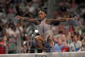 Simone Biles competes on the balance beam during the U.S. gymnastics championships in Fort Worth, Texas.