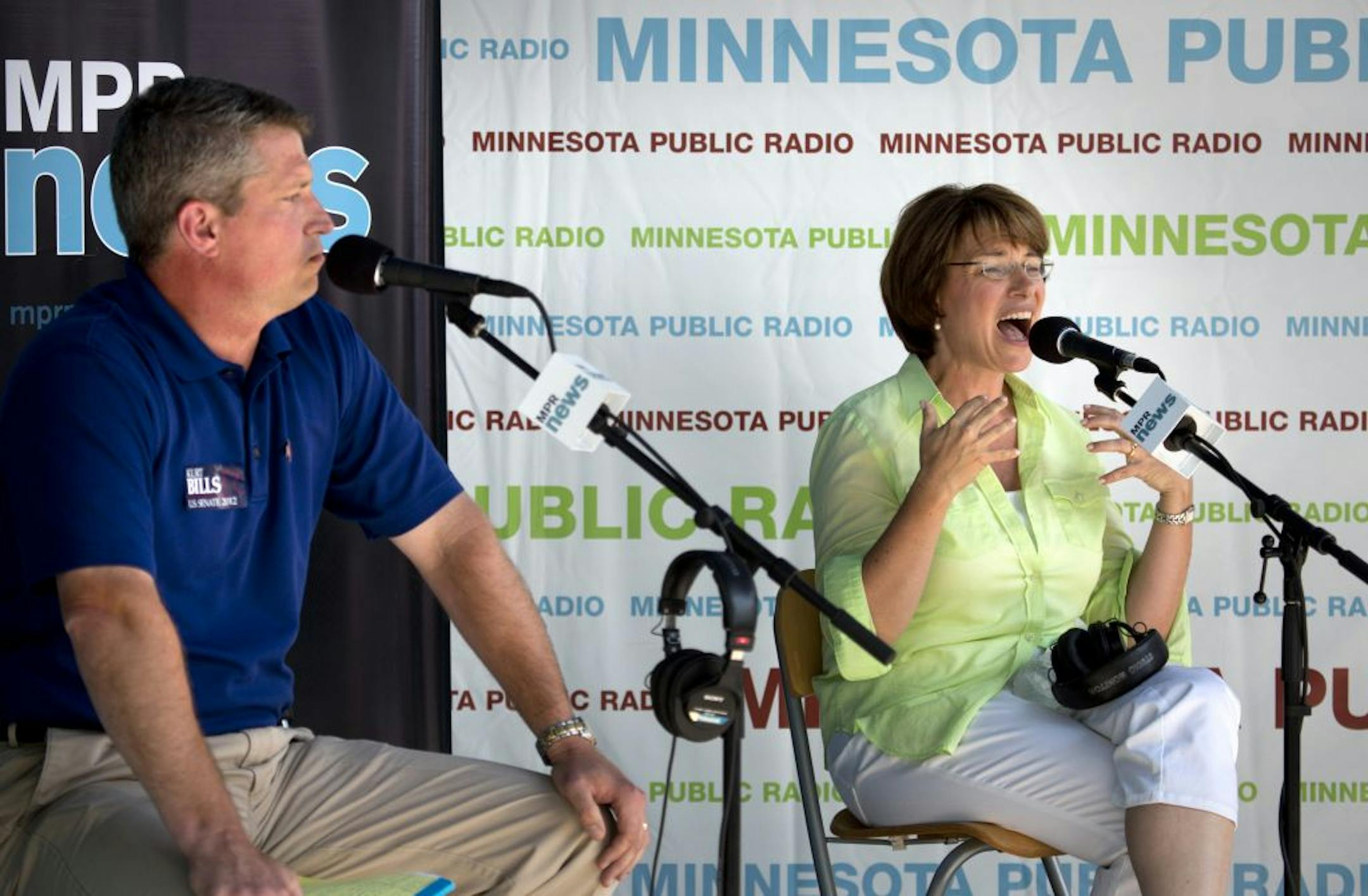 State Rep. Kurt Bills, left, and Sen. Amy Klobuchar tangled in an hourlong debate Thursday at the State Fair.