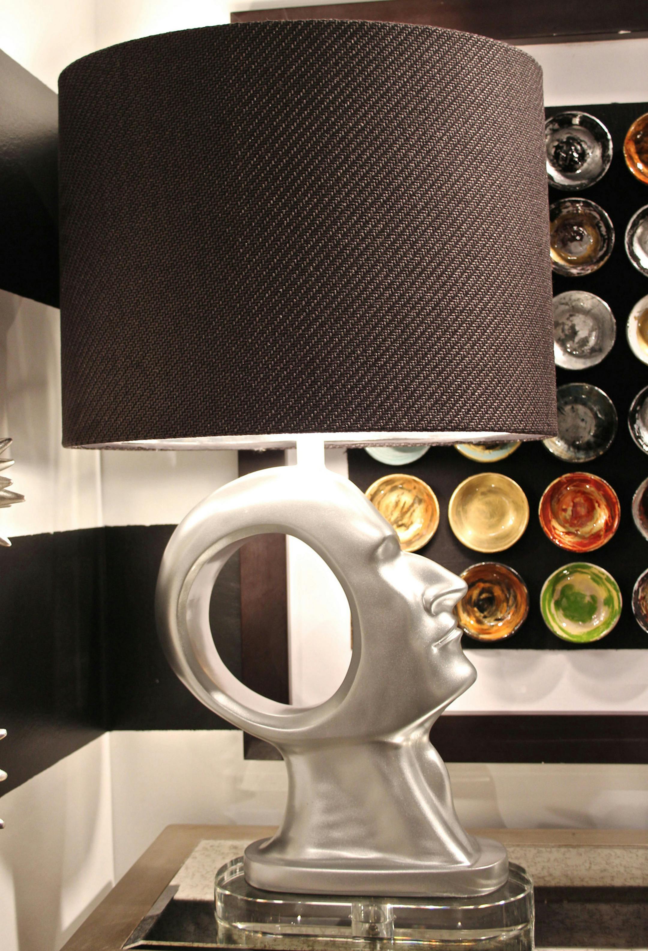 Joburg table lamp by Harp & Finial. Right facing male, silver resin finish on a crystal base. Also available in a left facing female. (Patricia Sheridan/Pittsburgh Post-Gazette/TNS)