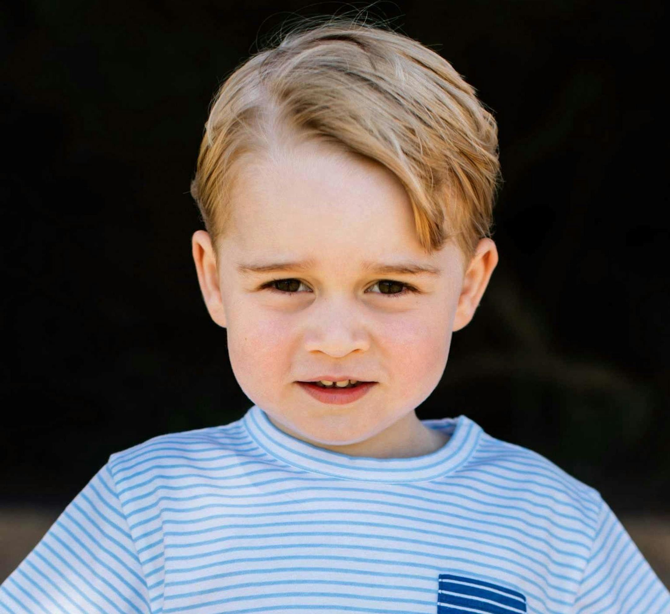 Recent but undated handout photo issued on Friday July 22, 2016 by William and Kate, the Duke and Duchess of Cambridge, of Britain's Prince George at Sandringham in Norfolk, England, who celebrates his third birthday on July 22. (Matt Porteous/Handout via AP)