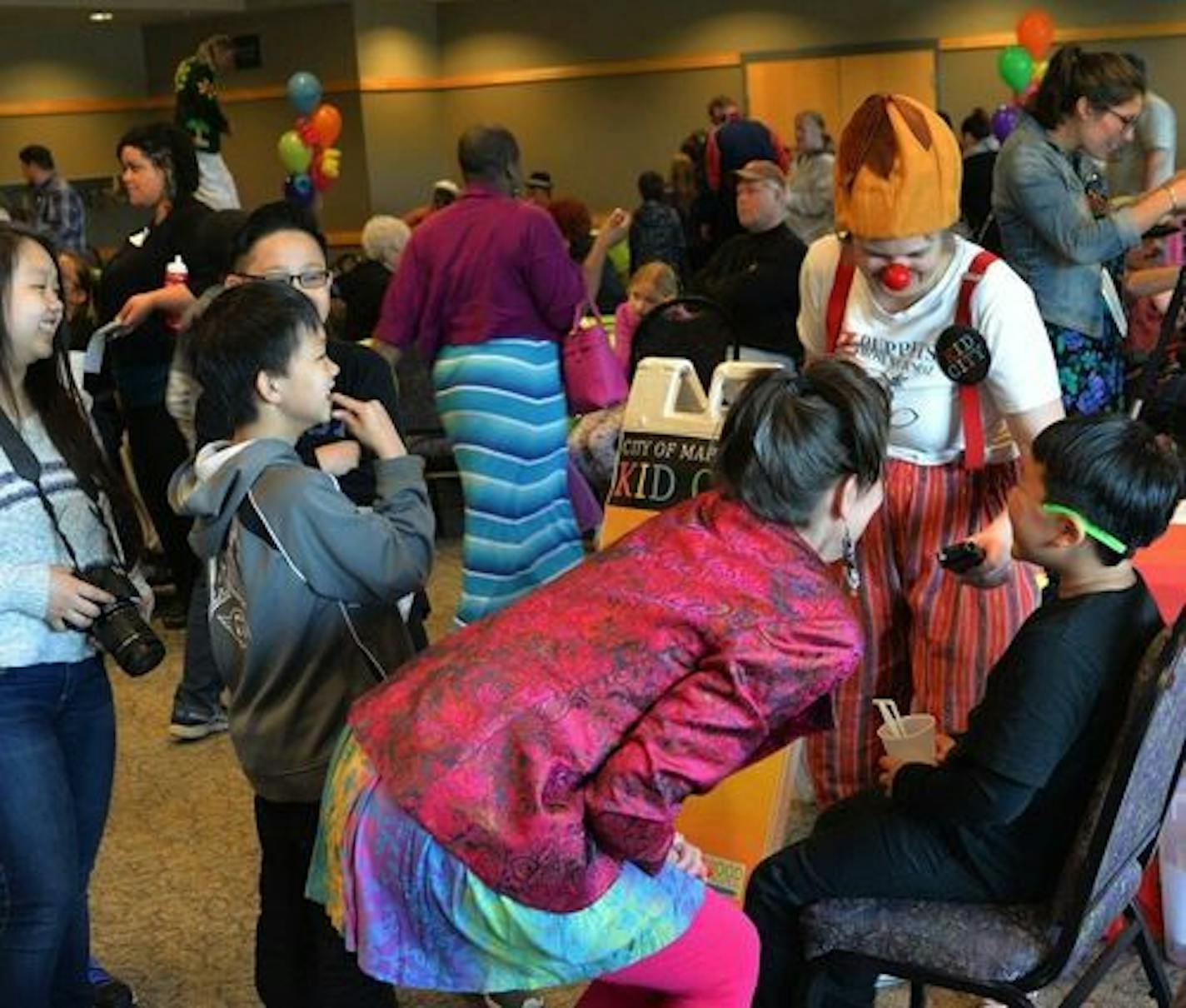 A clown with Z Puppets Rosenschnoz collected audio of laughter at a Maplewood YMCA event in 2016. The nonprofit troupe applied for State Arts Boards grants that have now been suspended.(File photo)