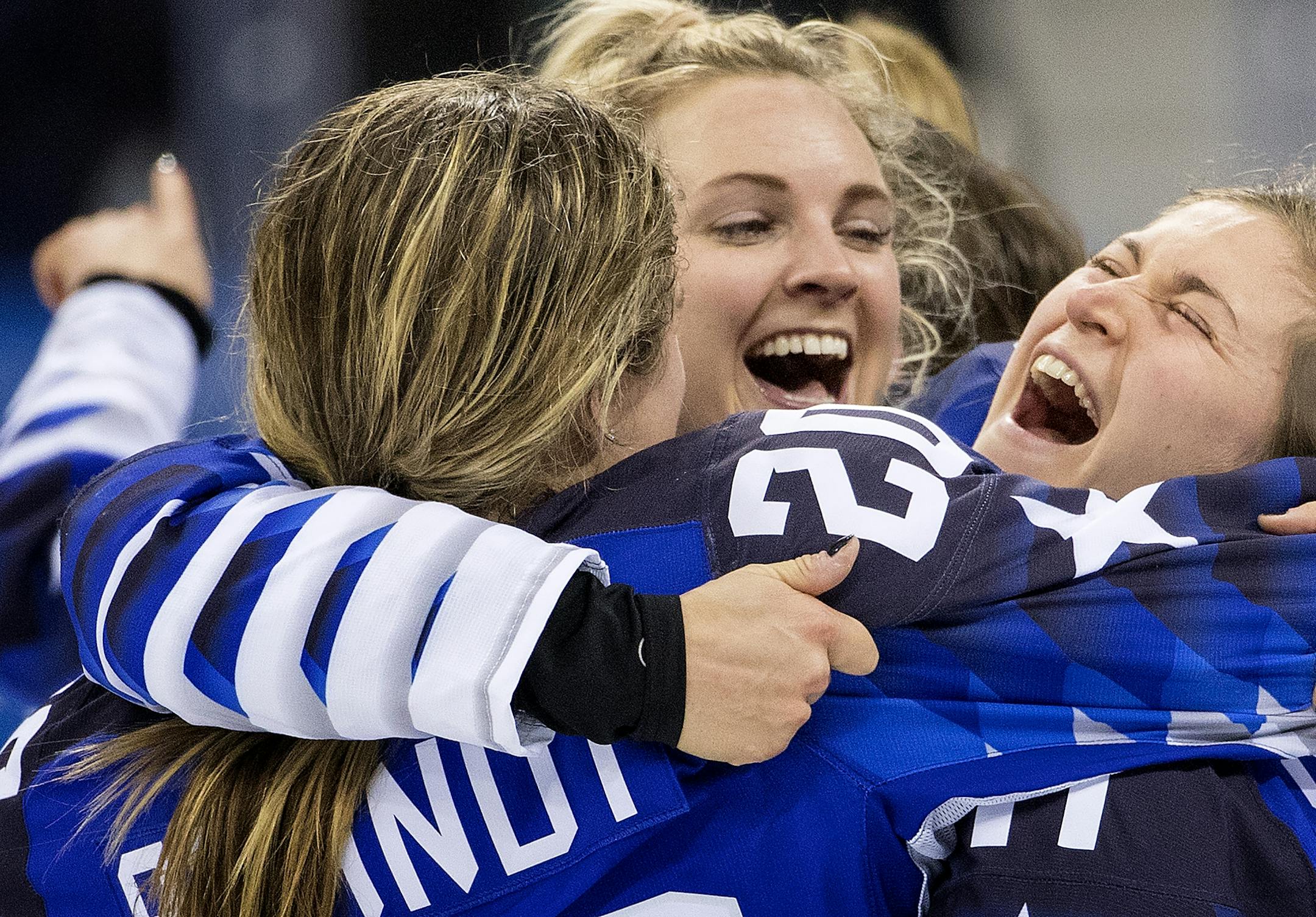 USA celebrated after beating Canada in a shootout to win the gold medal.