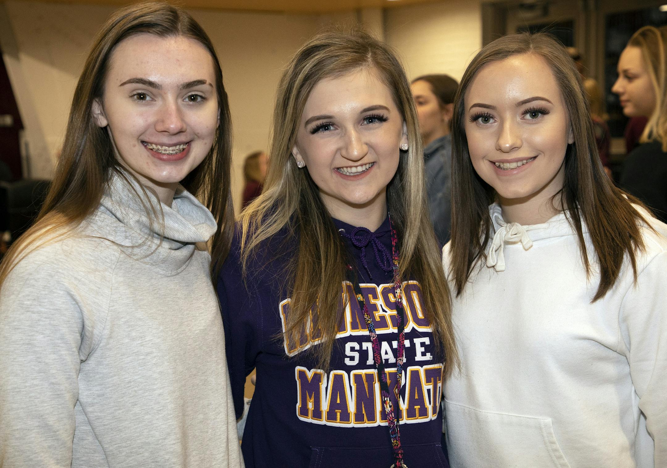 Sydney Seehusen, Mikayla Richer and Zetta Thurow with the Rochester Mayo High School dance team.
