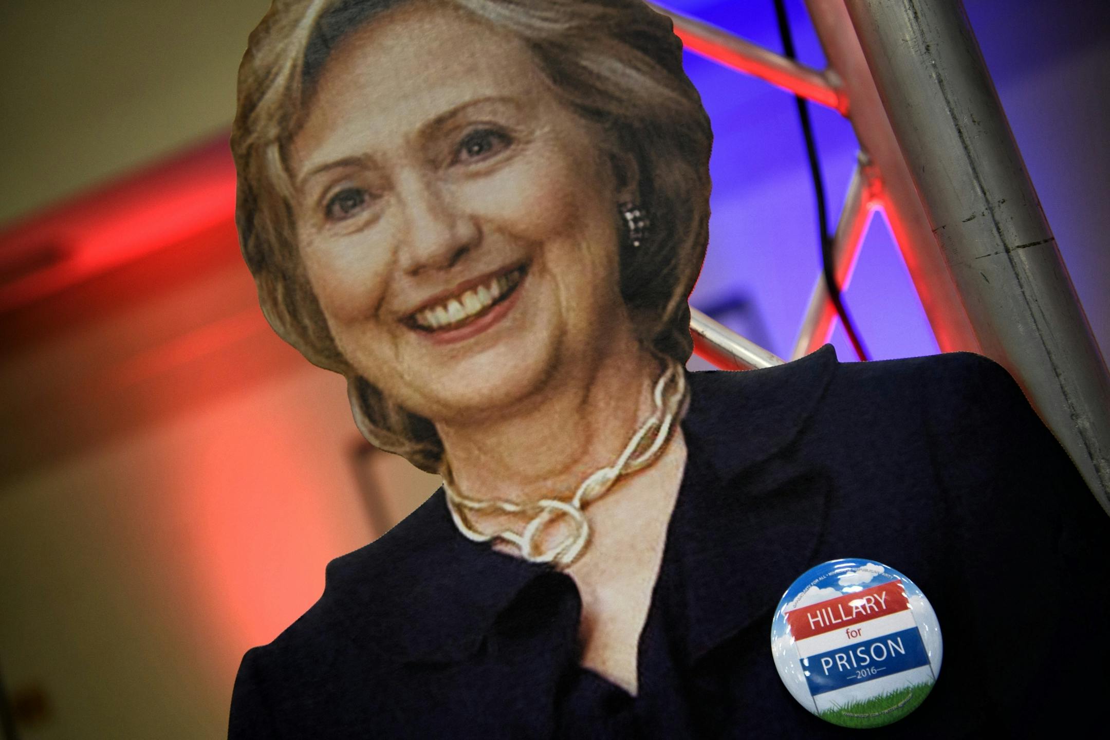 Someone put an anti-Hillary button on a lifesized cutout of Hillary Clinton.