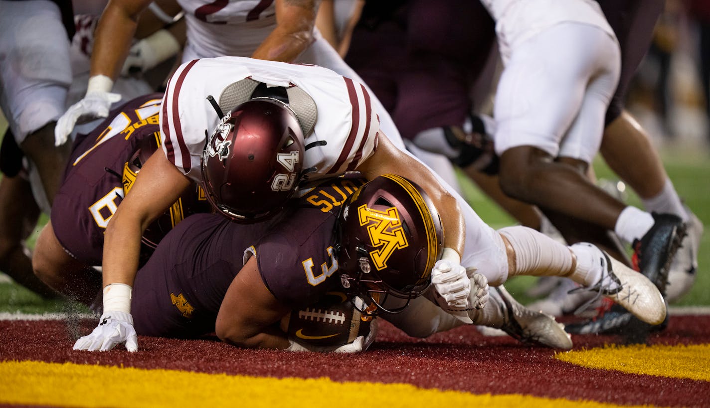 Minnesota Golden Gophers running back Trey Potts (3) scored from the one yard line in the third quarter at Huntington Bank Stadium in Minneapolis Thursday night, September 1, 2022. The University of Minnesota Gophers faced the New Mexico State Aggies in the opening football game of the season. ] JEFF WHEELER • Jeff.Wheeler@startribune.com