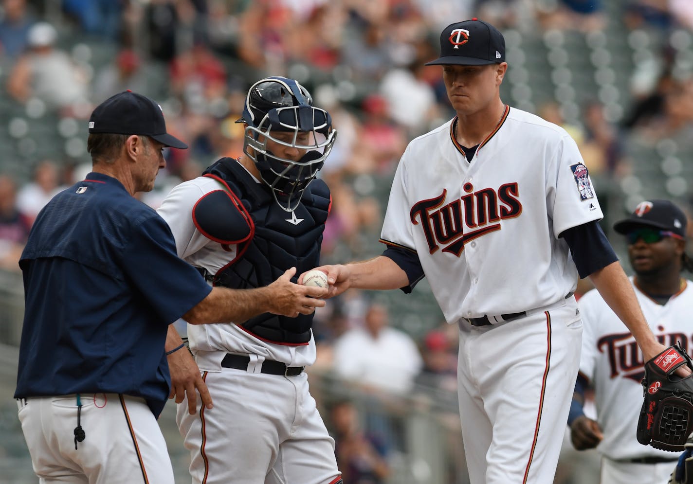 Twins starting pitcher Kyle Gibson, right, hands Twins manager Paul Molitor, left, as he leaves the mound in the fifth inning of a baseball game against the Baltimore Orioles earlier this month. Gibson was send down to Class AAA on Monday night.