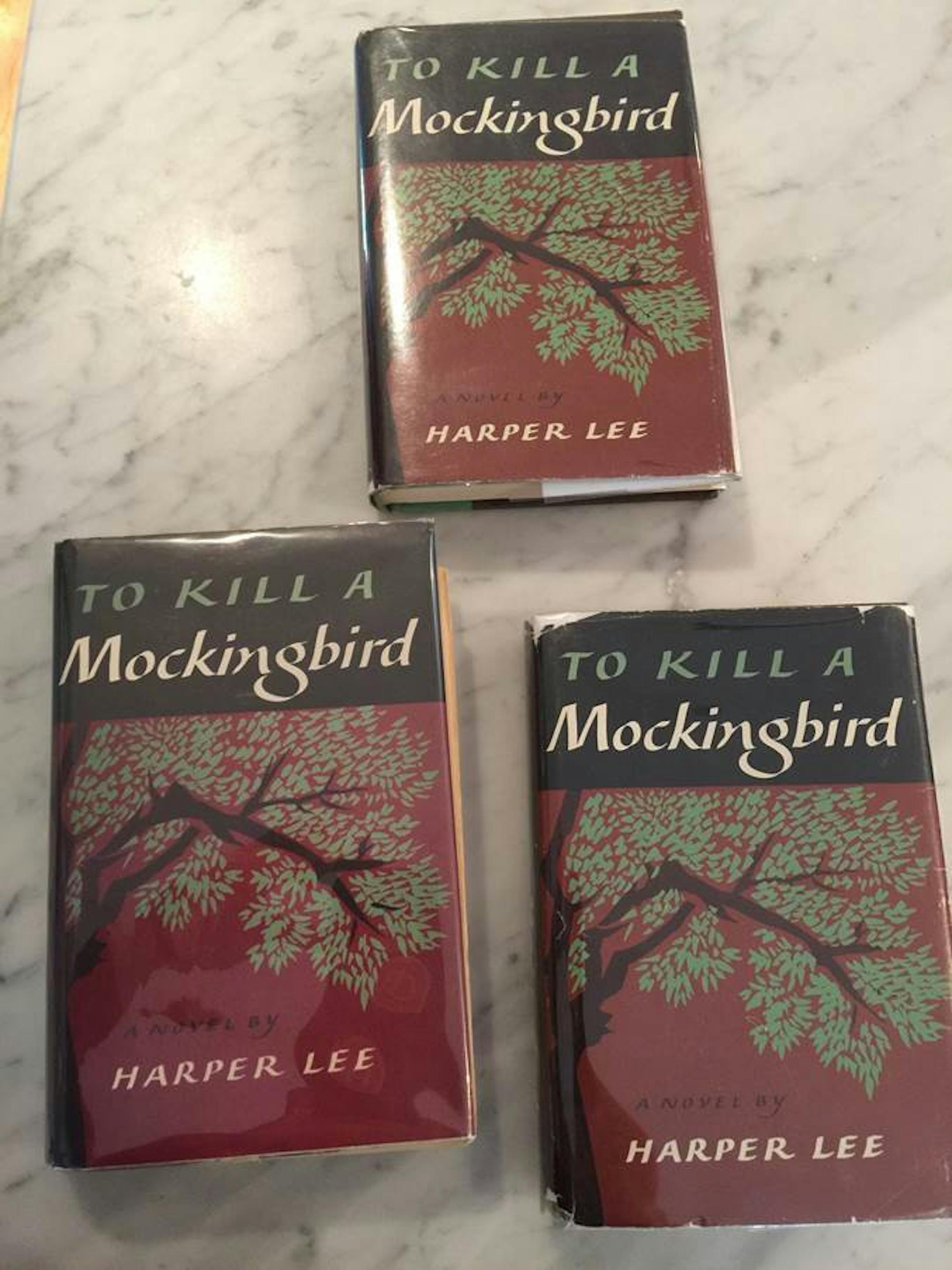 Three of the first edition copies of "To Kill A Mockingbird" that Harper Lee signed for Jack Jablonski.