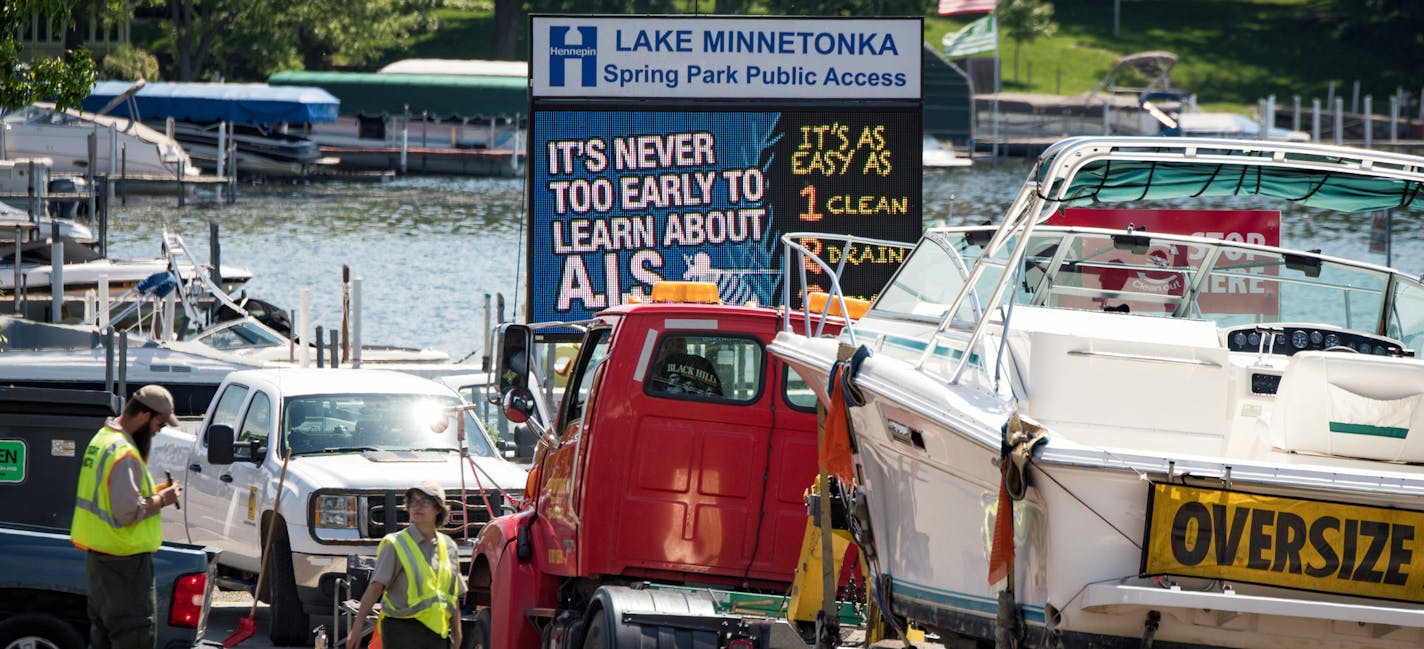 DNR workers checked every boat launching and being pulled from Lake Minnetonka in Spring Park. A.I.S or Aquatic invasive species. ] GLEN STUBBE &#x2022; glen.stubbe@startribune.com Friday, May 26, 2017 Memorial Day weekend kicks off the unofficial start to the boating season in Minnesota. Boaters this year will continue to see ramped up efforts statewide to enforce safe boating and inspections aimed at slowing the spread of invasive species from lake to lake