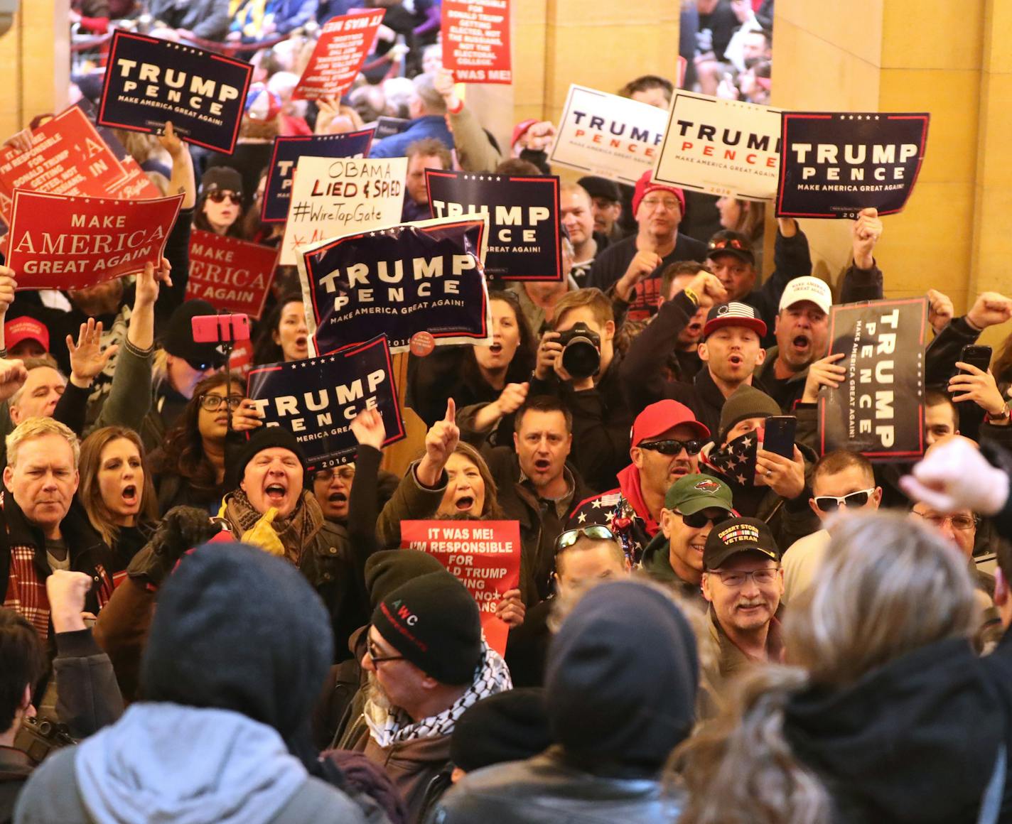 Pro President Donald Trump supporters and anti-Trump protesters exchanged words in the rotunda hallway during a national March4Trump at the State Capitol Saturday, March 4, 2017, in St. Paul, MN. ] DAVID JOLES &#xef; david.joles@startribune.com National March4Trump Saturday, March 4, 2017, at the State Capitol in St. Paul, MN.