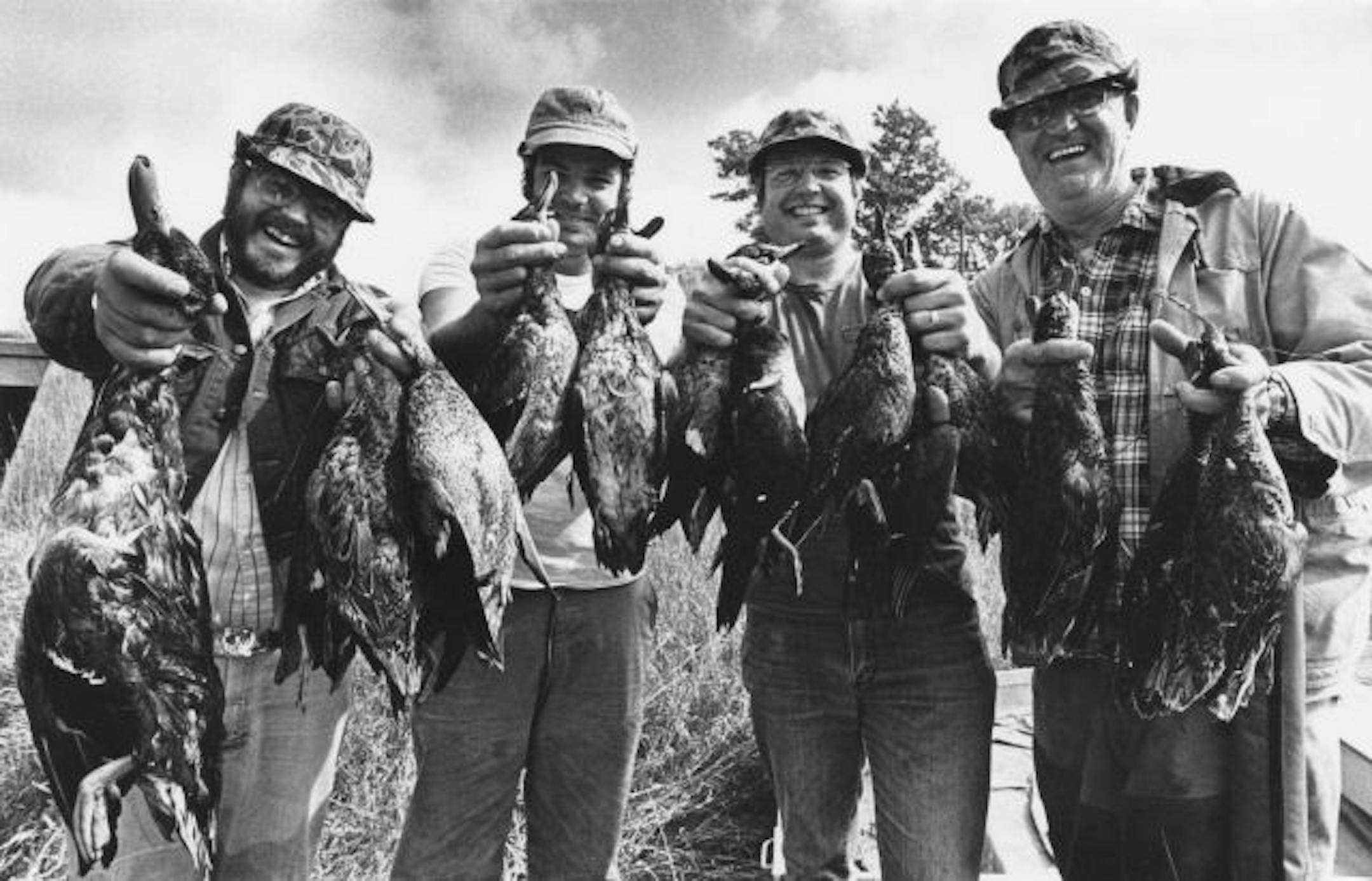 sons-Jim, Jerry, John and father Ron Schlagel.