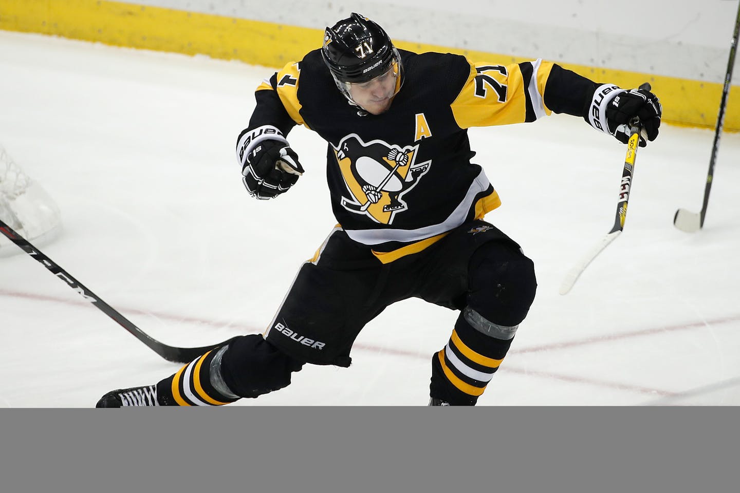 Pittsburgh Penguins' Evgeni Malkin (71) celebrates his goal during the first period of an NHL hockey game against the Minnesota Wild in Pittsburgh, Thursday, Jan. 25, 2018. (AP Photo/Gene J. Puskar)