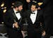 Director/producer Ben Affleck, left, and producer Grant Heslov accept the award for best picture for "Argo" during the Oscars at the Dolby Theatre on 