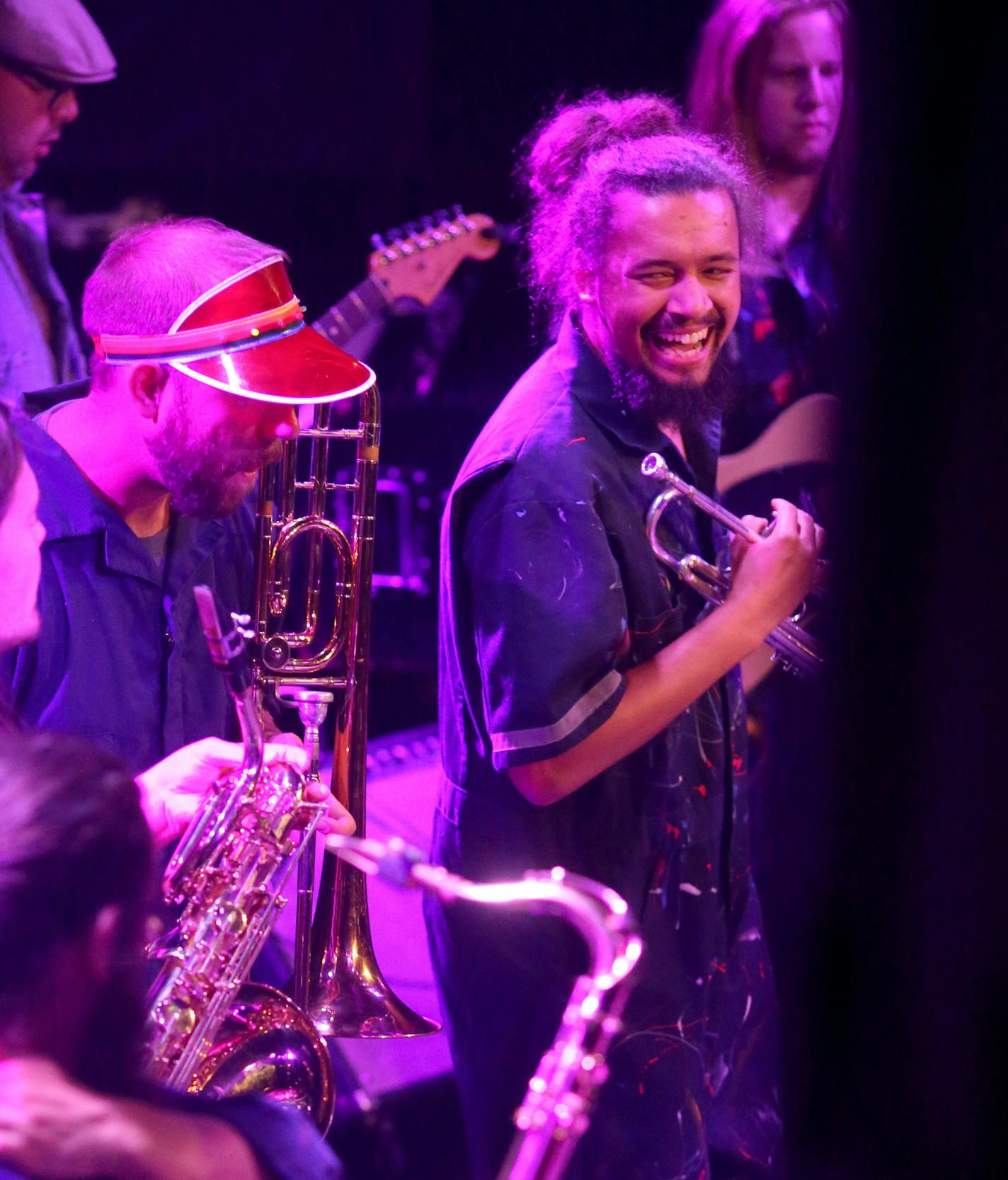 Trumpet player Cameron Kinghorn, at right, joked around with other members of the band as they played at First Avenue last weekend.