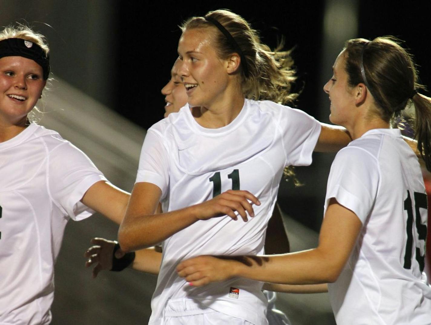 Anna Porch, center, was congratulated after scoring a second half goal.