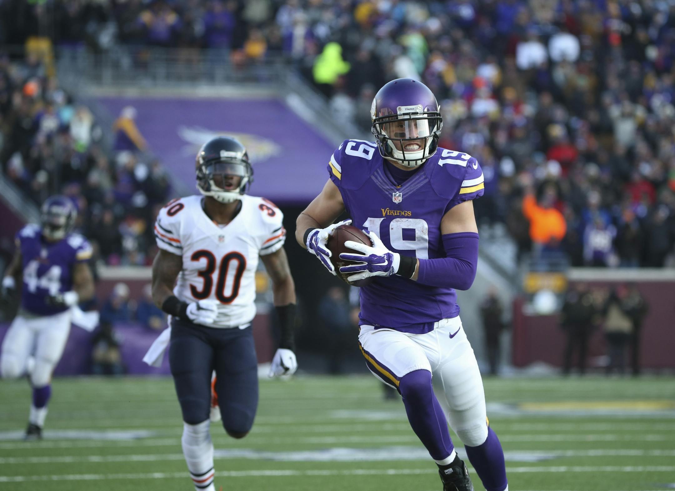 Minnesota Vikings wide receiver Adam Thielen (19) headed for the end zone after he hauled in a 44 yard touchdown pass in the third quarter Sunday afternoon at TCF Bank Stadium. The touchdown was his first as a pro.