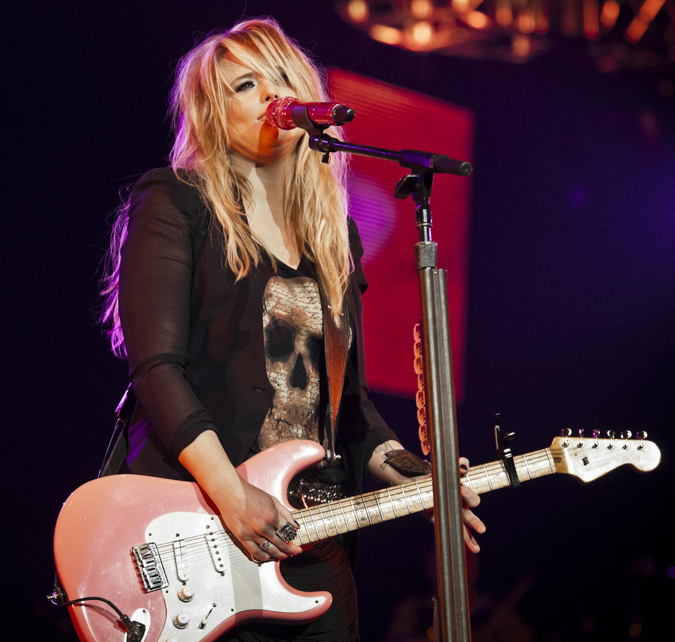Singer-songwriter Miranda Lambert performs during her "On Fire" tour at the Izod Center in East Rutherford, N.J., Jan. 28, 2012. Lambert's tour includes songs from her new album, "Four the Record." (Chad Batka/The New York Times) ORG XMIT: XNYT28