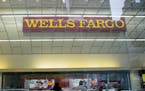 FILE -- A Wells Fargo bank branch in New York, April 7, 2017. About one million people who took out car loans from Wells Fargo were charged for auto i