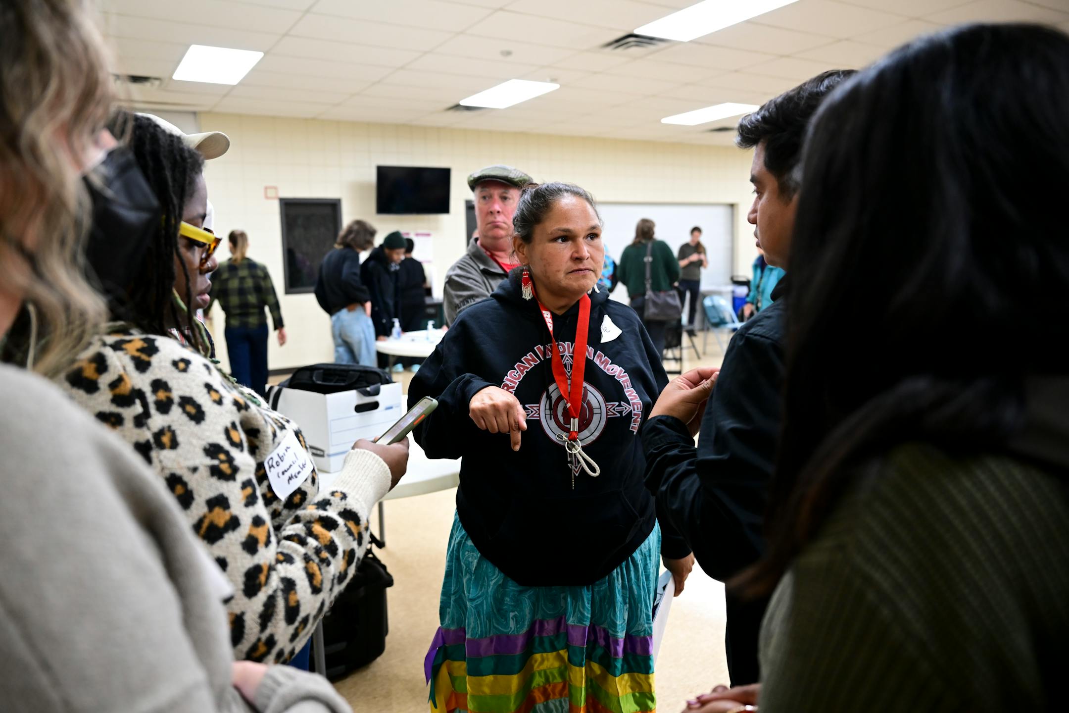 Encampment organizer Nicole Mason, enrolled with the Red Lake Nation, speaks to Minneapolis officials including council members Robin Wonsley and Jason Chavez Tuesday, Sept. 12, 2023, at the Phillips Community Center in Minneapolis. Ward 9 Council Member Jason Chavez organized an emergency housing/encampment meeting after the sweep of the Wall of Forgotten Natives in late August.