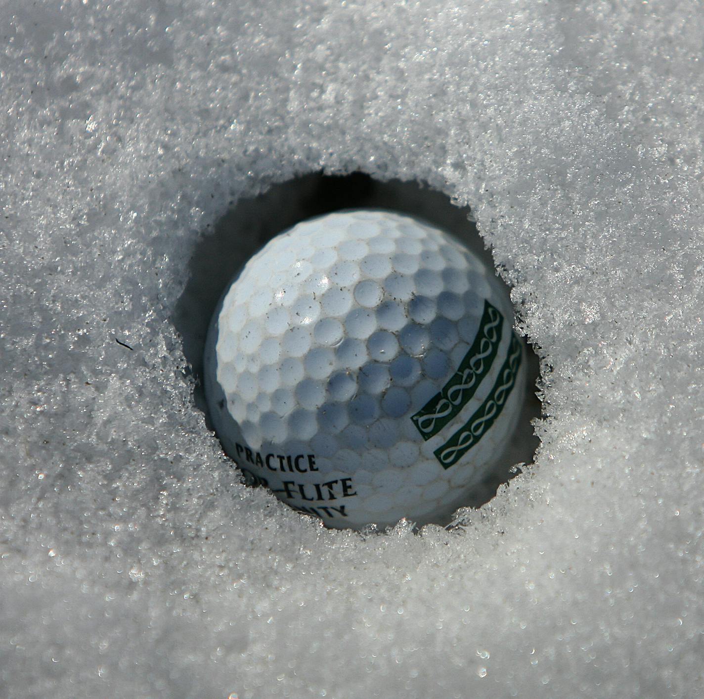 JIM GEHRZ &#x2022; jgehrz@startribune.com
Lake Elmo/February 17, 2007/12:30PM
Despite frigid, winter temperatures, golf enthusiasts are able to practice their swings at the Country Air Golf Park in Lake Elmo. Golfers are protected from the elements by a heated, wooden hut that opens to a driving range. Golf balls land in the snow and are sometimes buried.