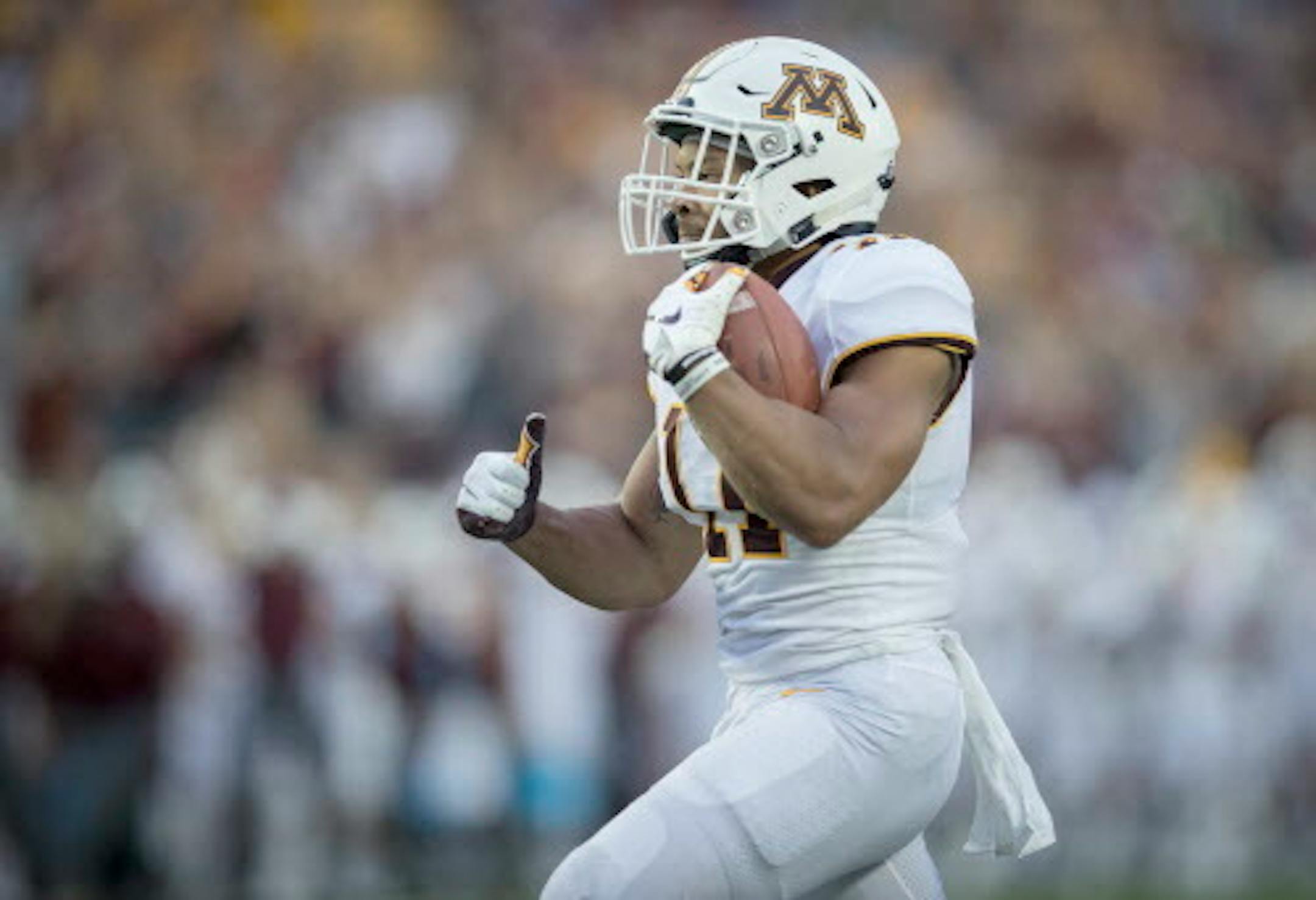Minnesota's defensive back Antoine Winfield Jr. broke away from New Mexico's defense to return the ball 76 yards for a touchdown in the second quarter Minnesota took on New Mexico State at TCF Bank Stadium, Thursday, August 30, 2018 in Minneapolis, MN.    ]  ELIZABETH FLORES ' liz.flores@startribune.com
