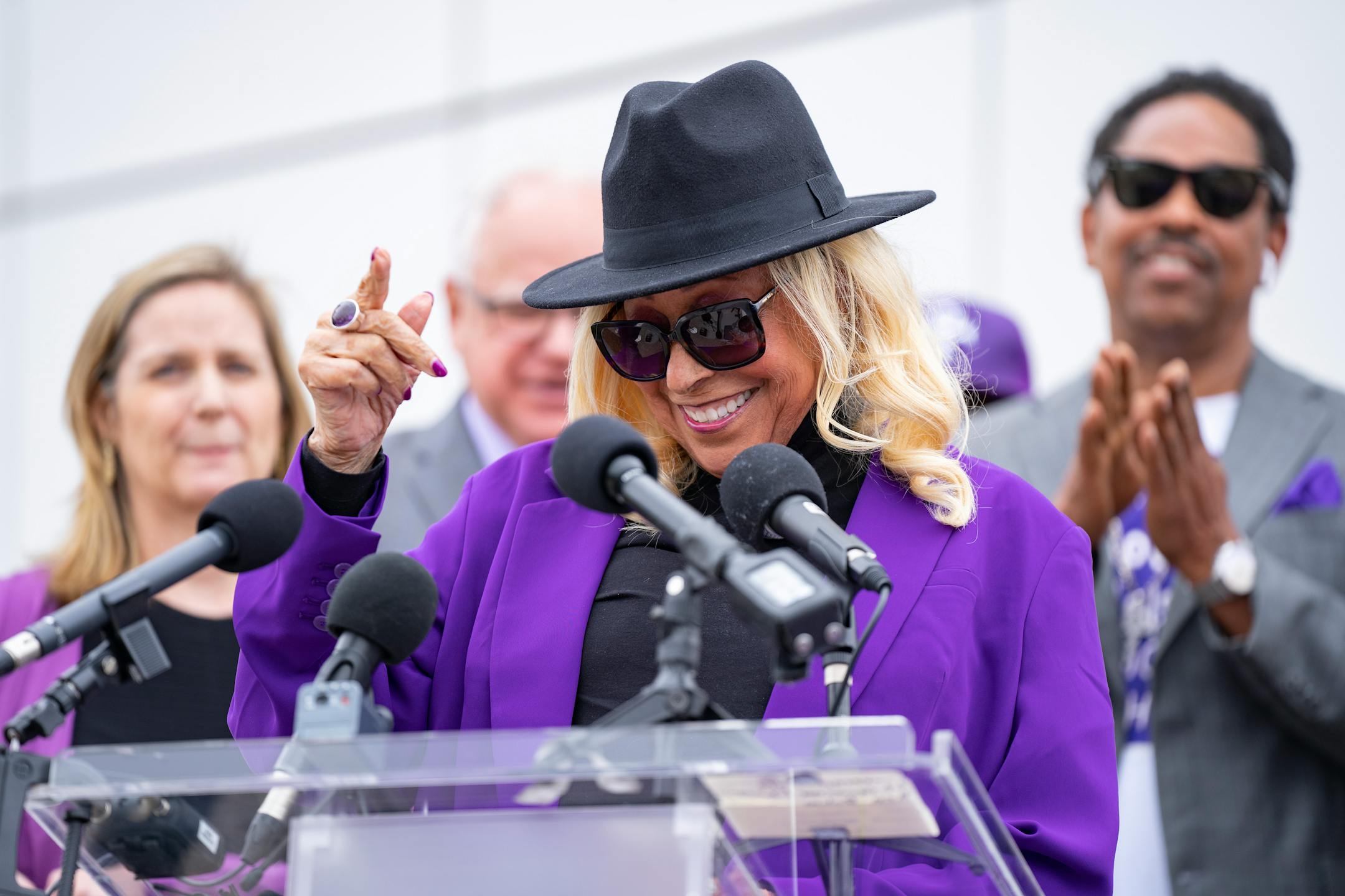 Sharon Nelson, Prince's sister, speaks to the press before Governor Tim Walz signs a bi-partisan bill renaming a 7-mile stretch of Highway 5 as "Prince Rogers Nelson Memorial Highway."