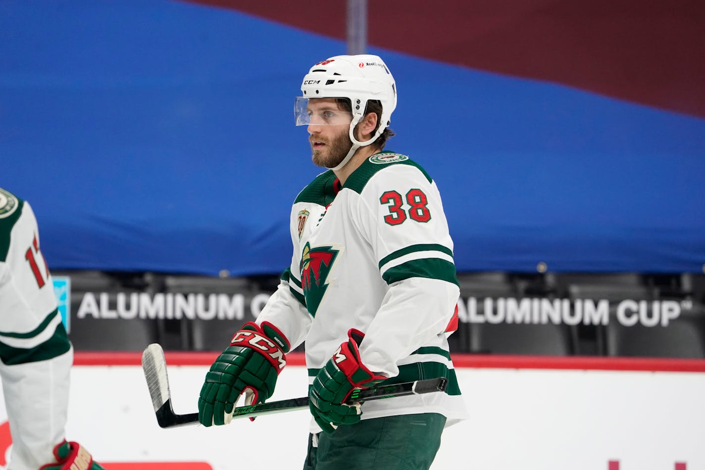 Minnesota Wild right wing Ryan Hartman (38) in the second period of an NHL hockey game Wednesday, Feb. 24, 2021, in Denver. (AP Photo/David Zalubowski)