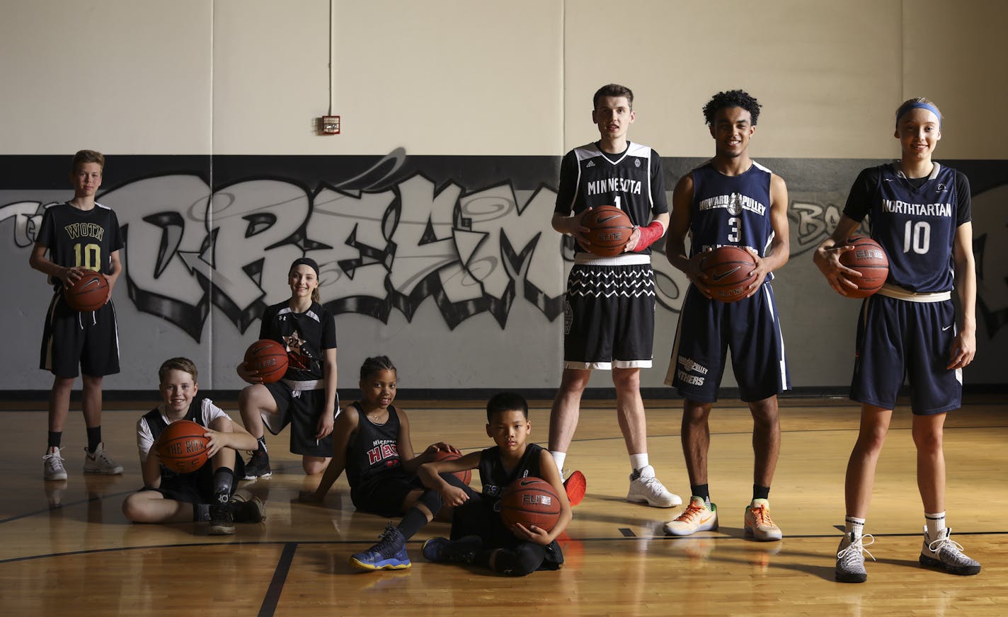 Pups to preps: High school basketball players Matthew Hurt (middle), Tre Jones and Paige Bueckers are part of the latest wave of standouts who have risen through Minnesota&#x2019;s AAU ranks. Following their lead are (from left) grade schoolers Jake Runyan (eighth), Gavin Pierce (sixth), Taryn Hamling (sixth), Maya Sampy (fourth) and Ethen Danh (fourth).