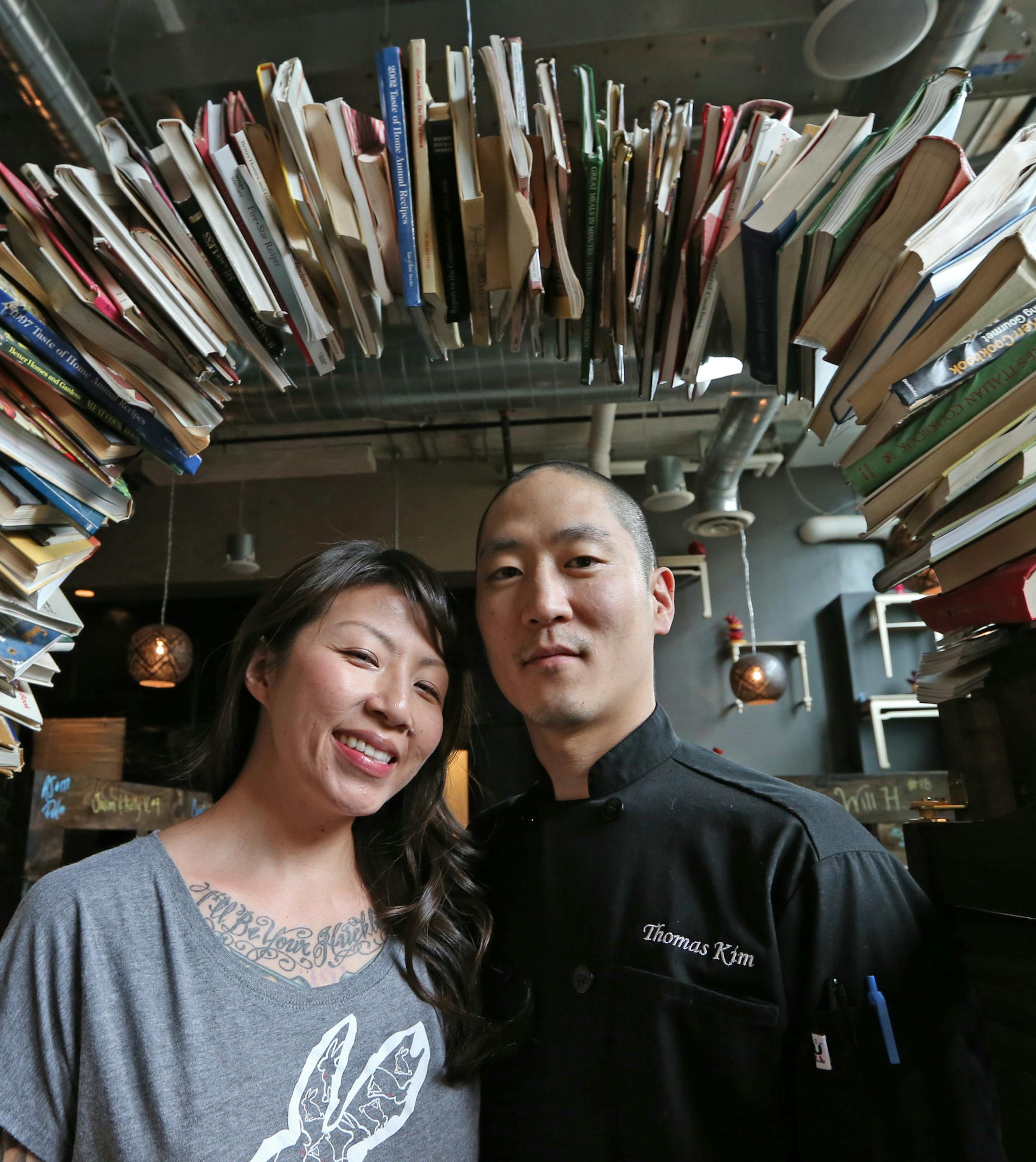 (left to right) Kat Kim and Thomas Kim, co-owners of the Rabbit Hole. Restaurant review: Rabbit Hole, the Korean gastropub in the Midtown Global Market, photographed on 5/9/14. Bruce Bisping/Star Tribune bbisping@startribune.com Kat Melgaard, Thomas Kim/source.