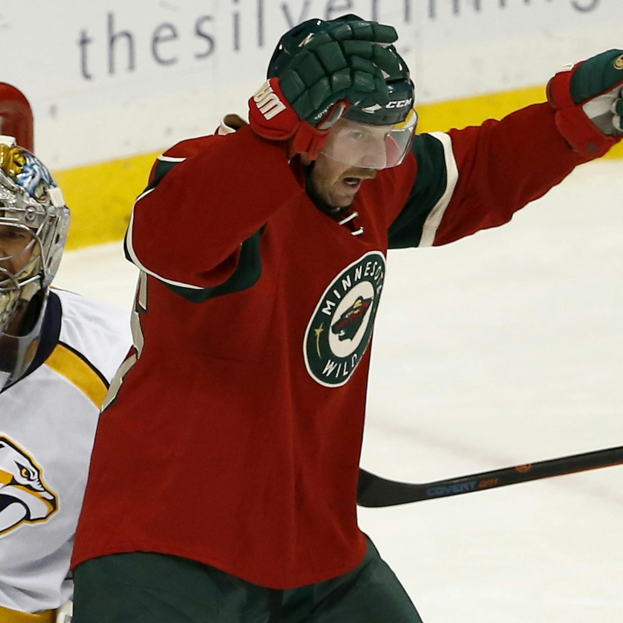 Nashville Predators goalie Pekka Rinne, left, of Finland, and Minnesota Wild left wing Thomas Vanek, right, of Austria, react after Wild defenseman Ryan Suter scored against Rinne during the first period of an NHL hockey game in St. Paul, Minn., Saturday, Nov. 21, 2015. (AP Photo/Ann Heisenfelt) ORG XMIT: MIN2016070619003951
